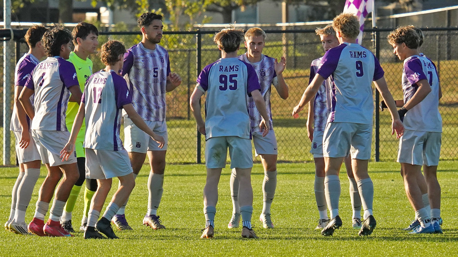 Men's soccer huddle