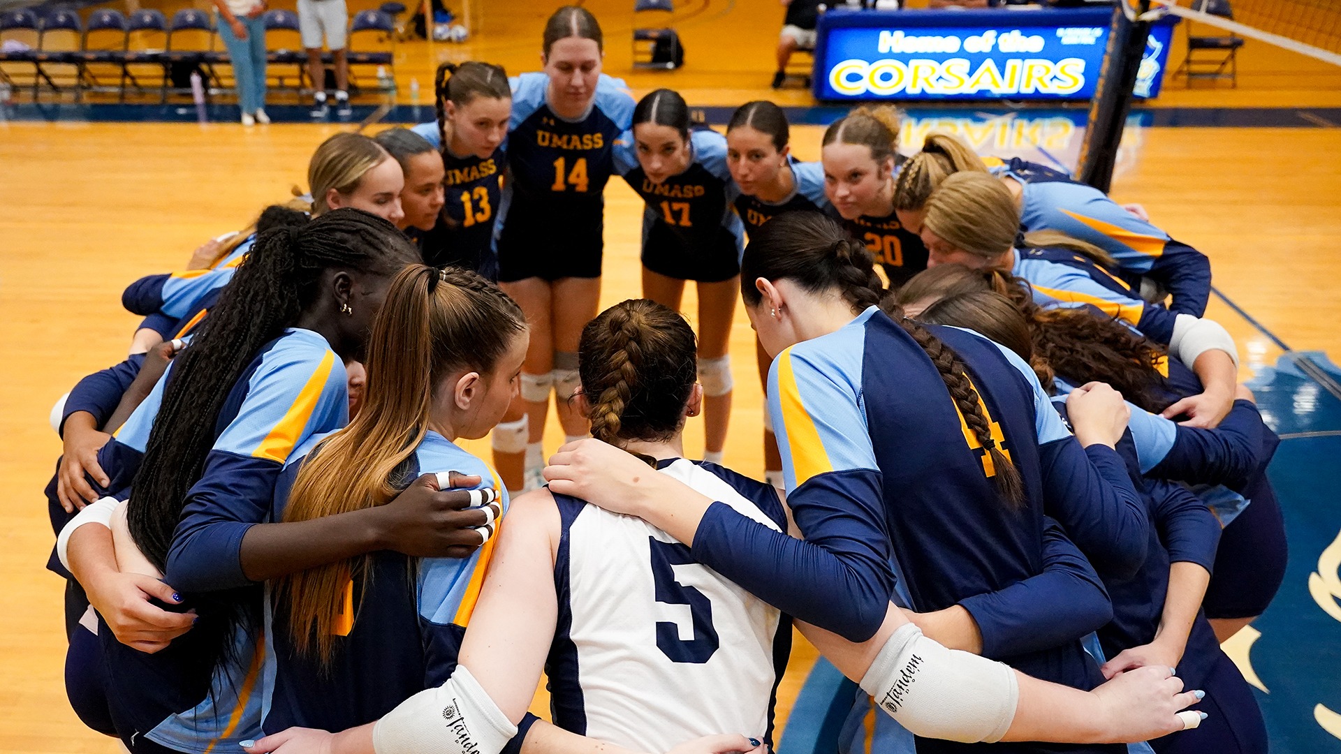 Volleyball Team huddle from 2025 season