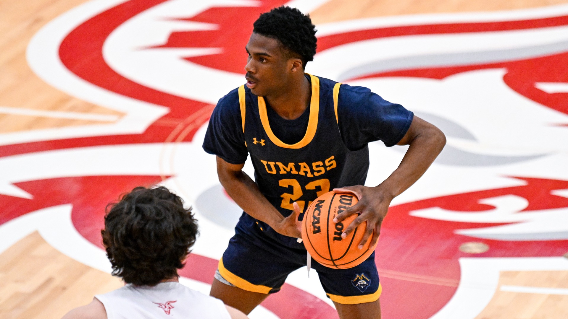 Isaiah Makor in action during a men's basketball game at WPI