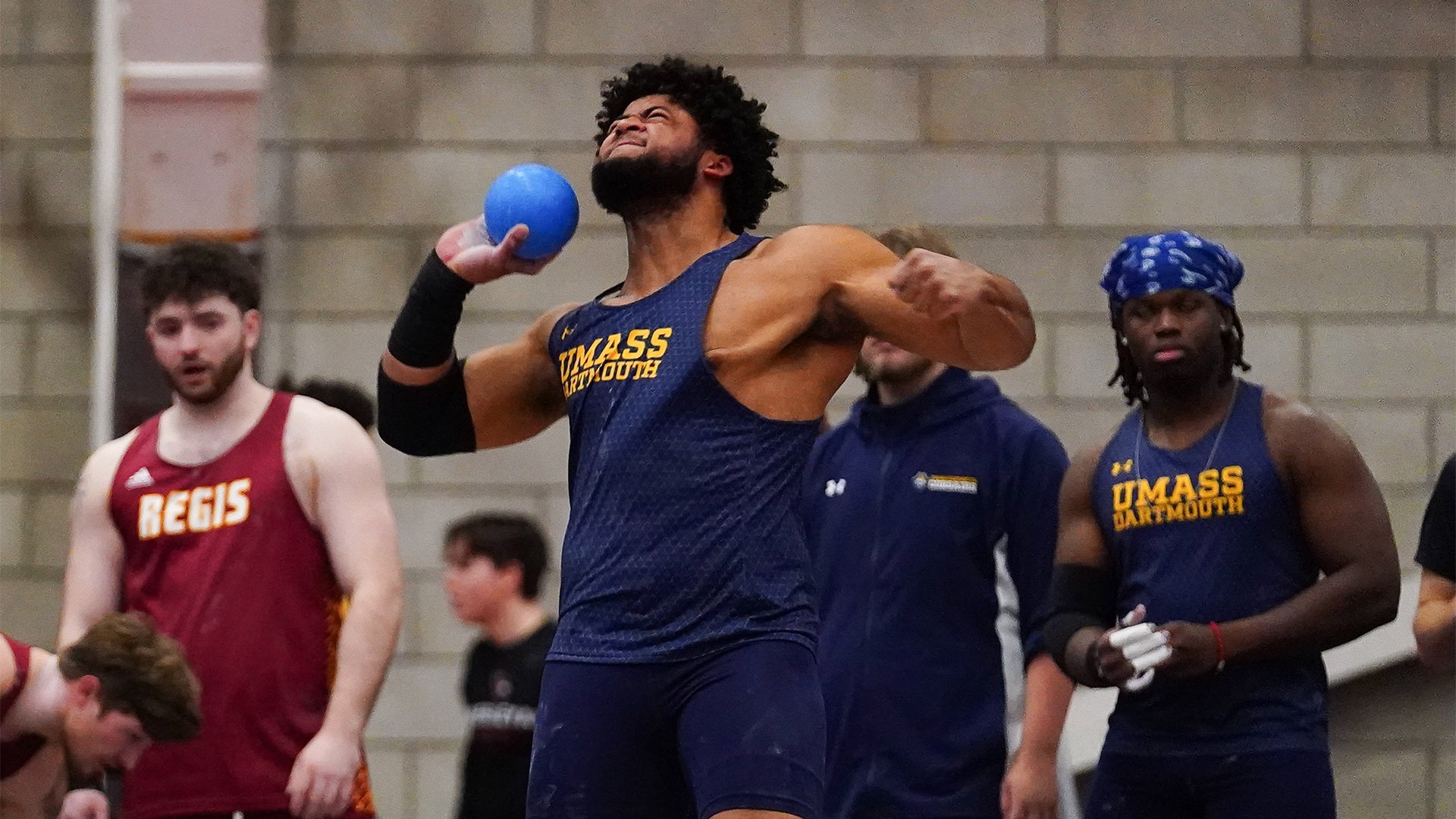 Ancil Alexander competes in the shot put event during an indoor track & field meet