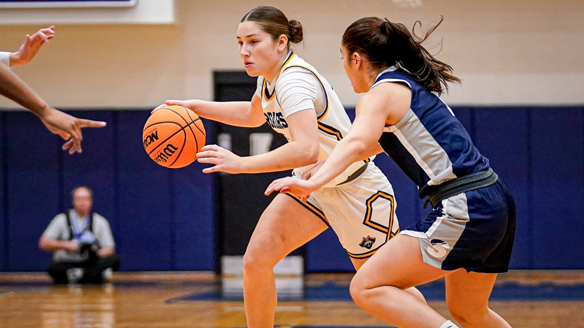 Womens_basketball_Melanie_DeMeo_dribbling_the_ball