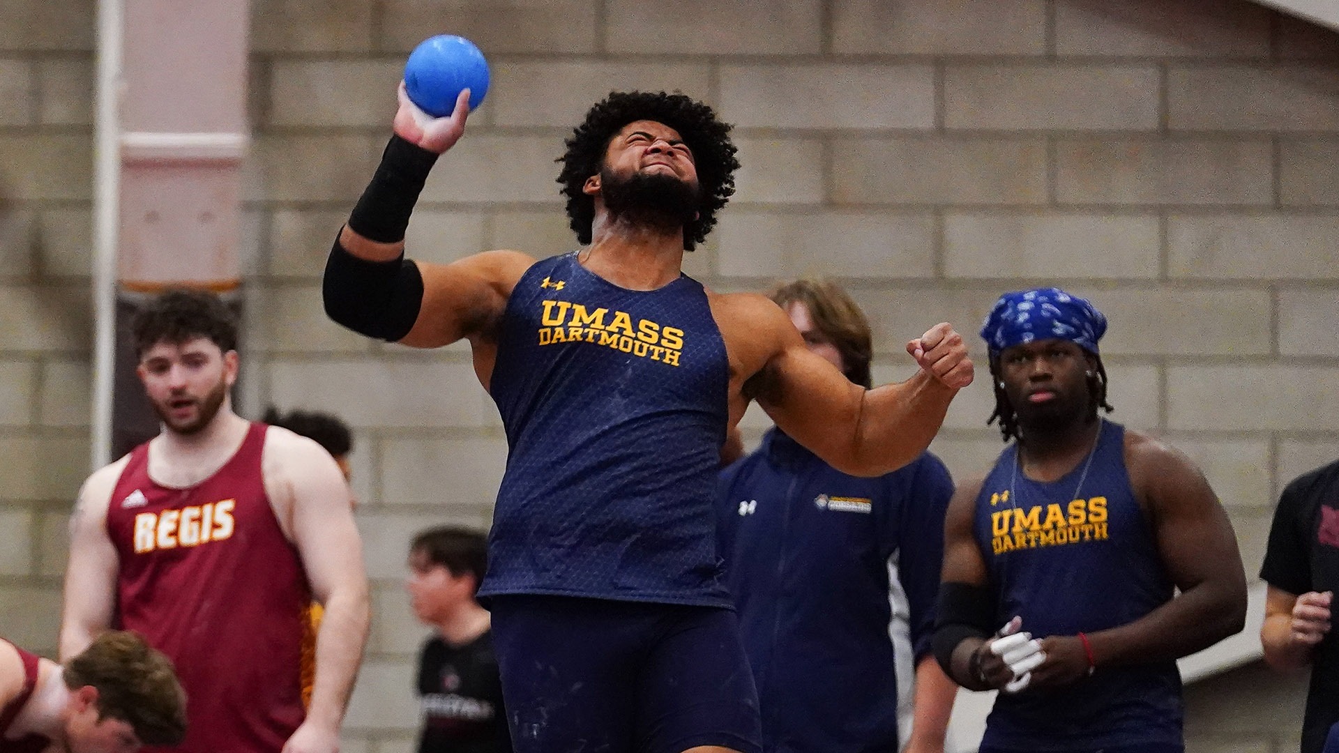 Ancil Alexander competes in the shot put at the Brandeis Invite