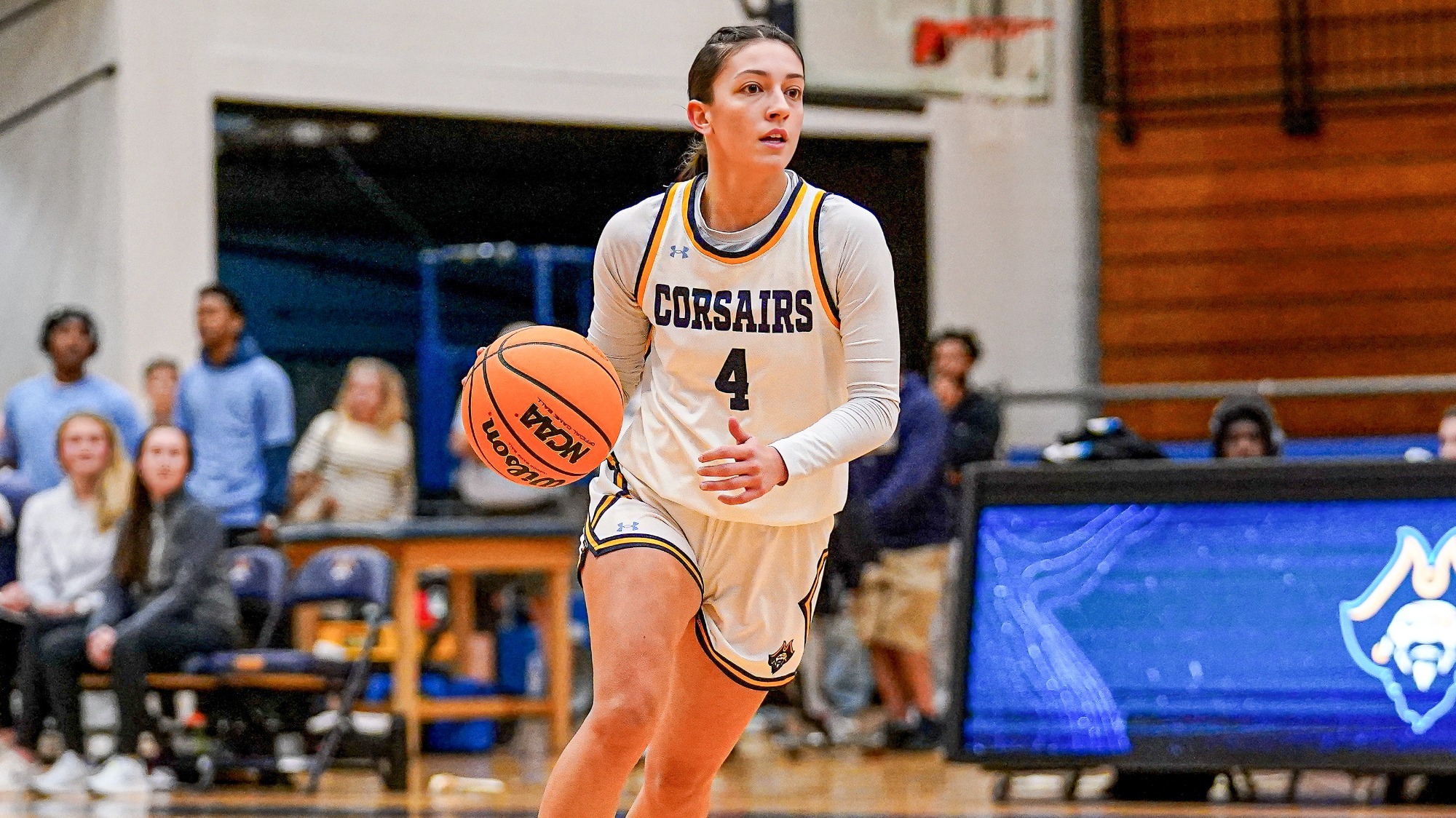 Womens_basketball_Kasey_Oliver_dribbling_the_basketball