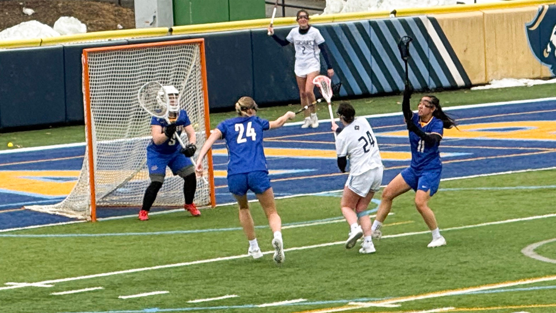 Carleigh Swenson scores a goal in a women's lacrosse game versus Maine Maritime - March 2026