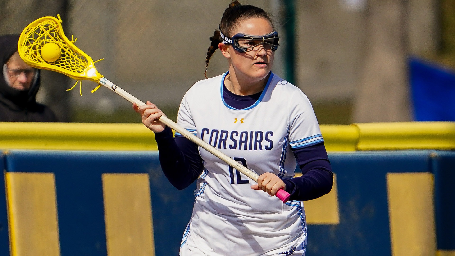 Abby Pitts competes in a women's lacrosse game against Regis College - March 2026