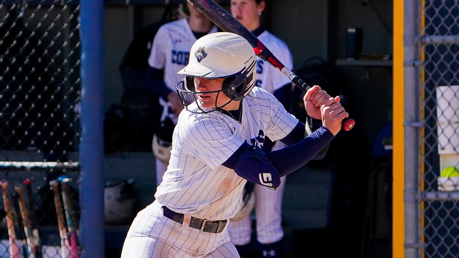 Emma Talpey at bat in a softball game against Bridgewater State