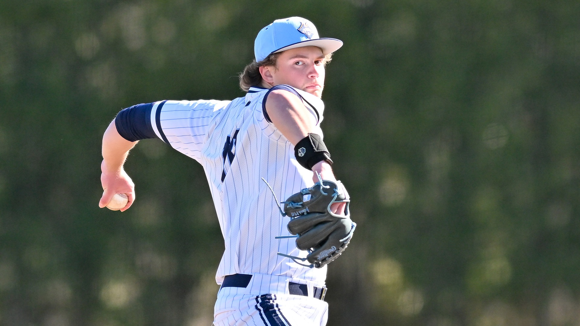 Jordan Paradis throws a pitch in a baseball game against Southern Maine - March 21. 2026