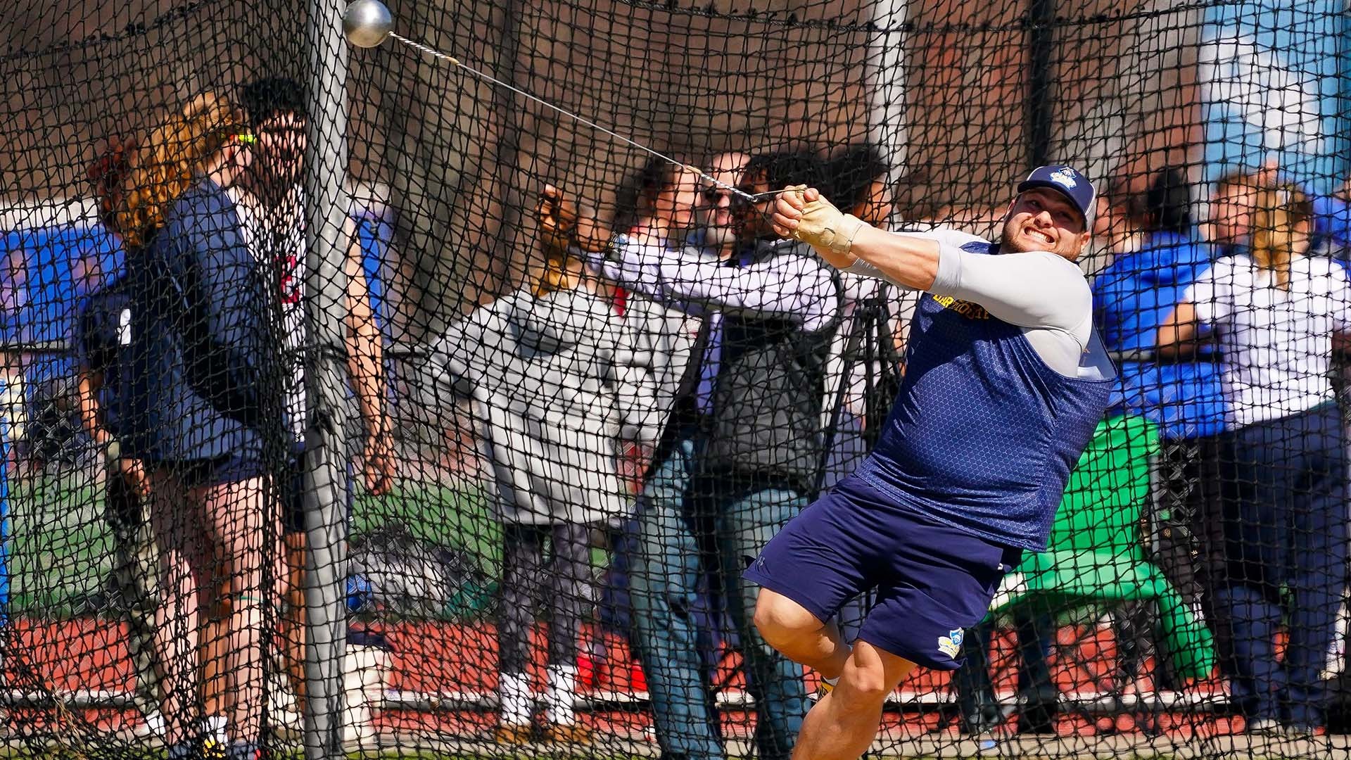 Michael Gama competes and wins the hammer throw at the Coast Guard Spring Invite