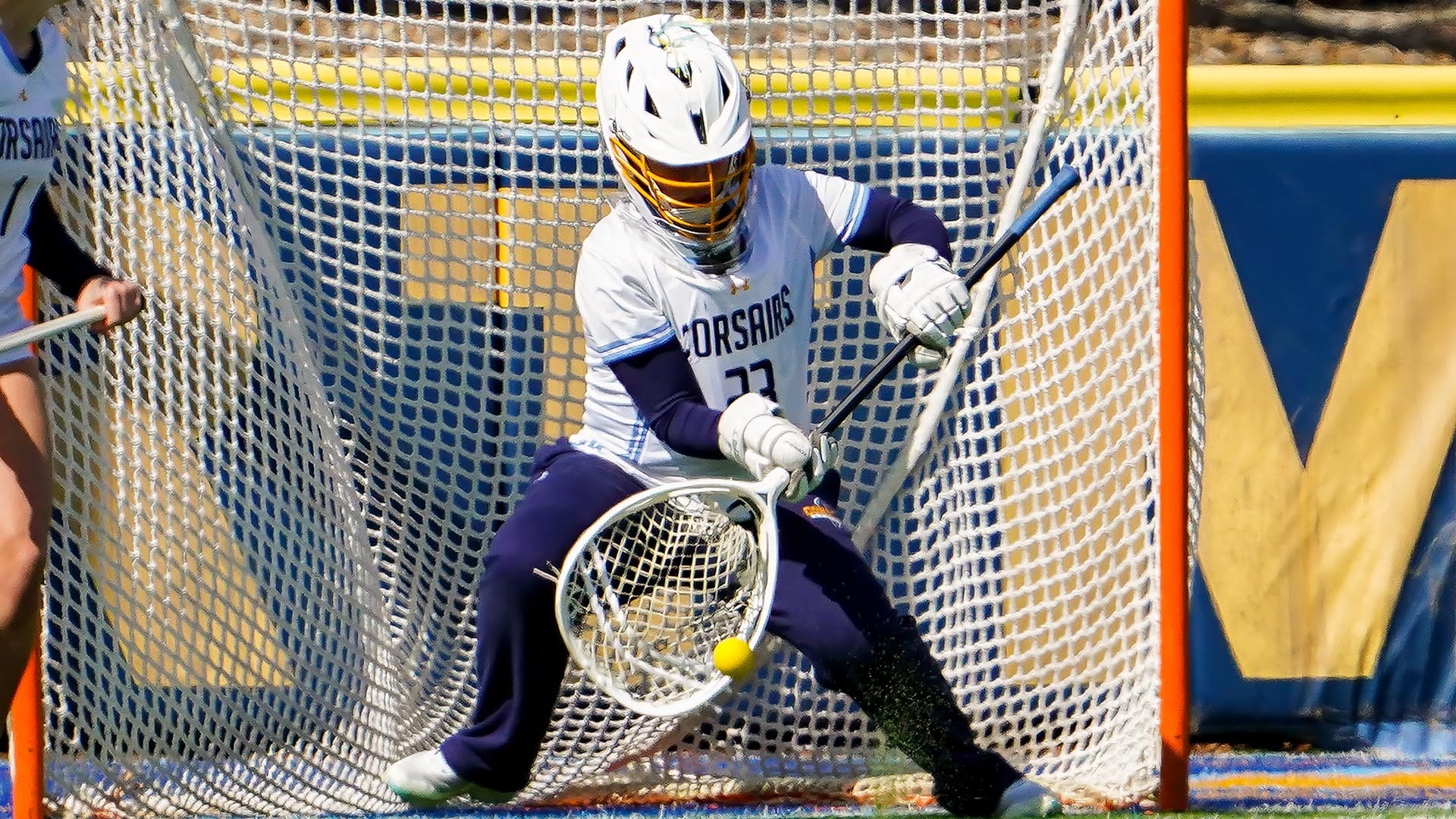 Keira Bushey makes a save in goal during a women's lacrosse game in March 2026