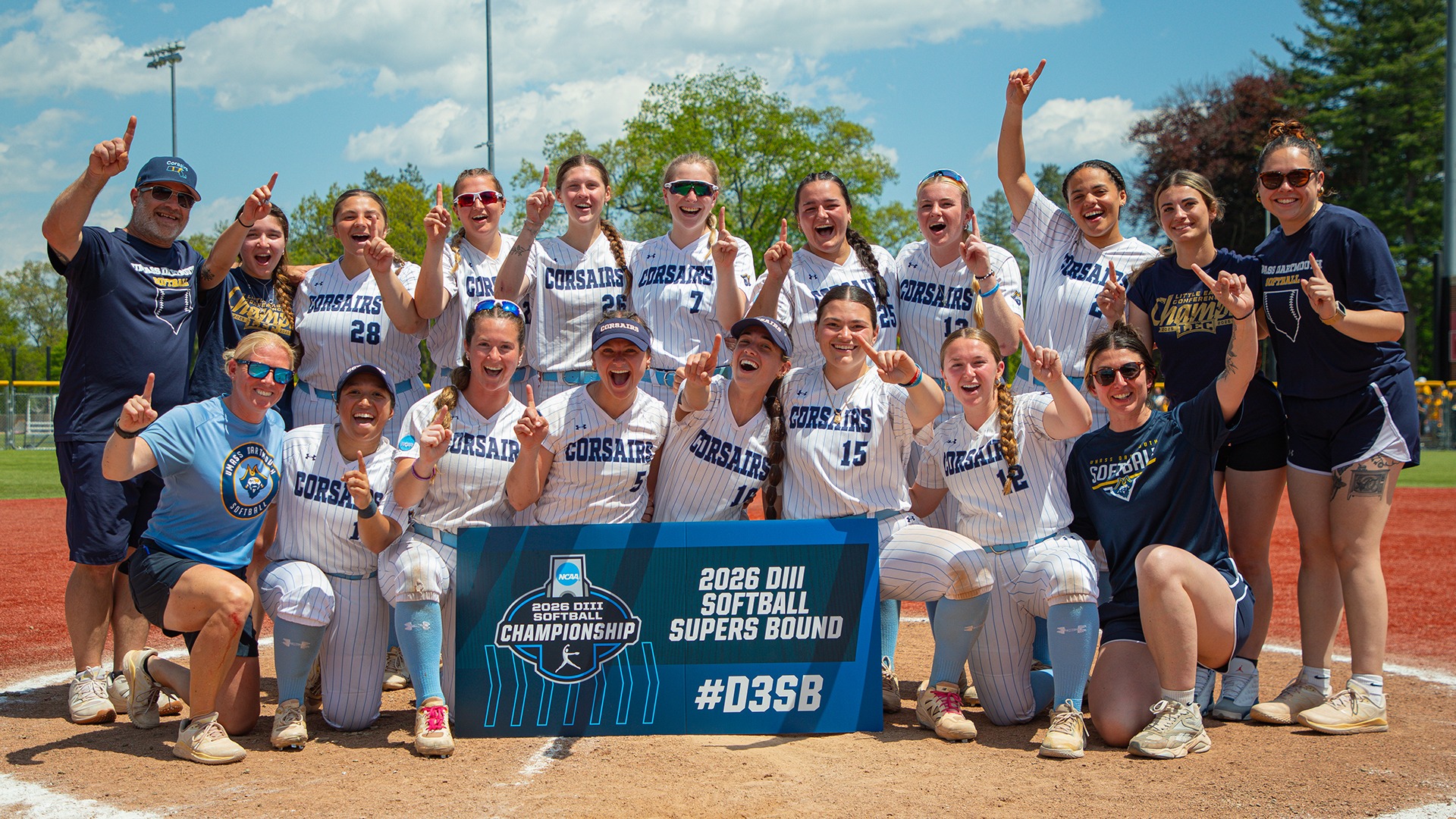 Softball celebrates on the field after winning the 2026 NCAA DIII Worcester Regional Championship