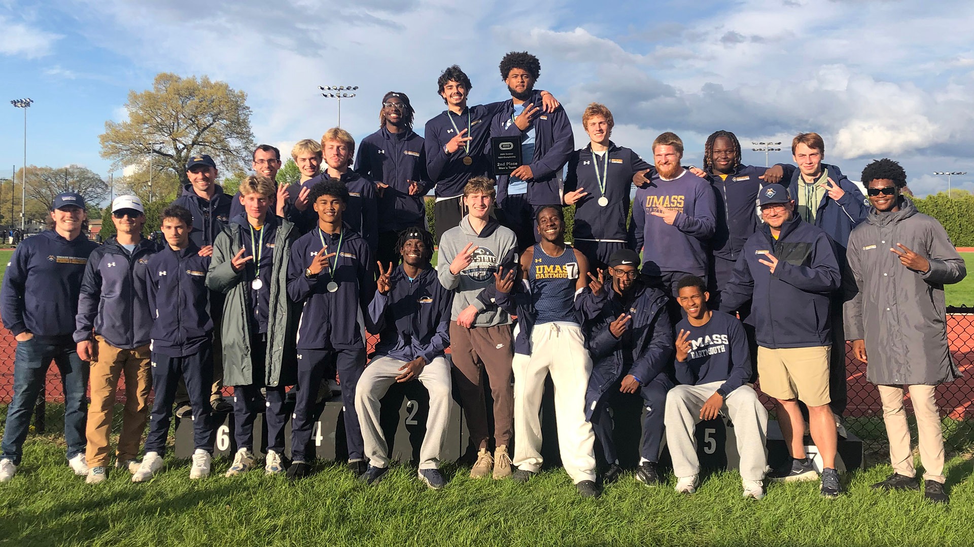 Men's Track & Field Poses as a team after finishing second at New England DIII Championships - May 2026