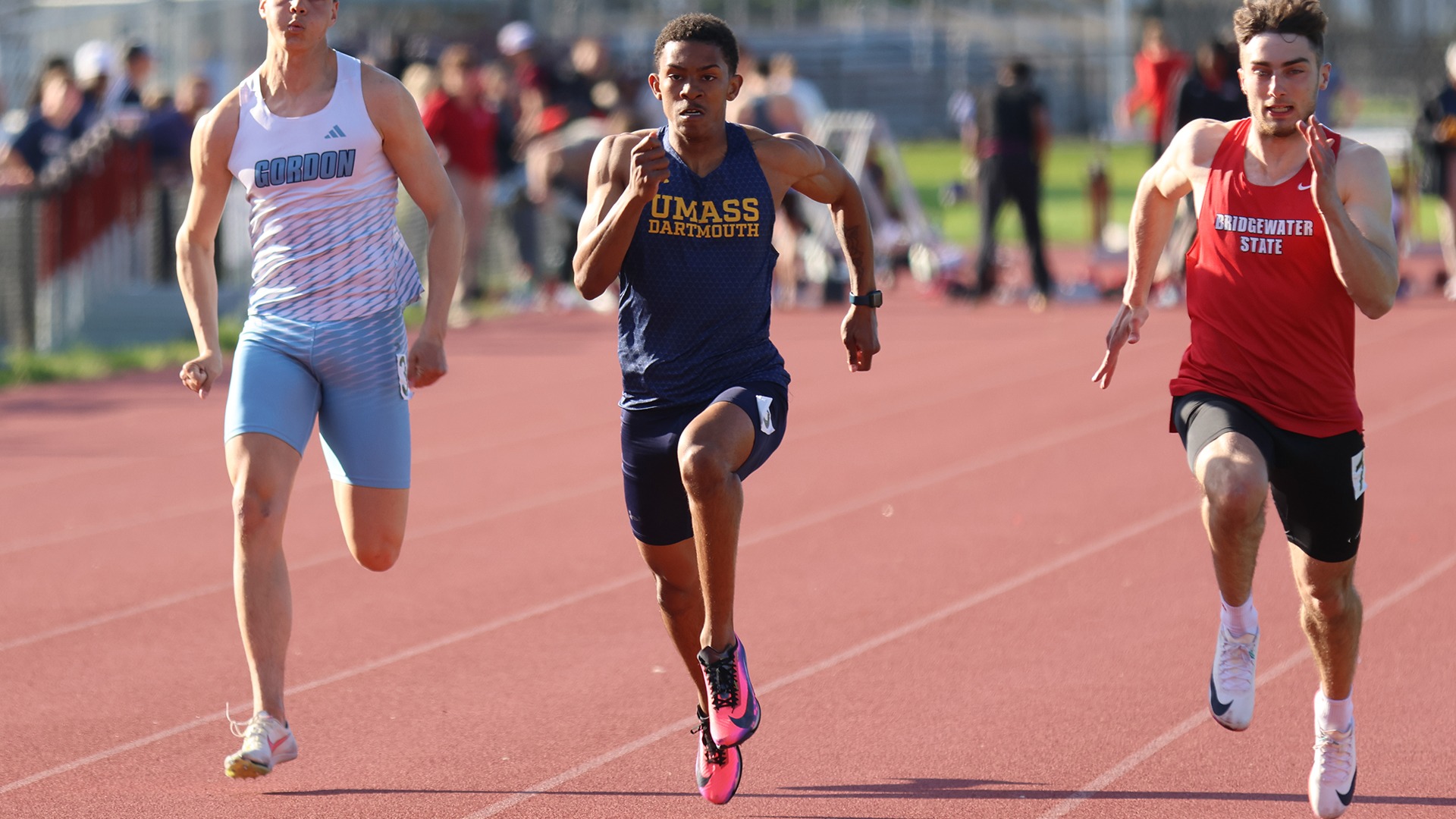 Justin Andrade races down the straightaway in the 100-meter dash - May 2026