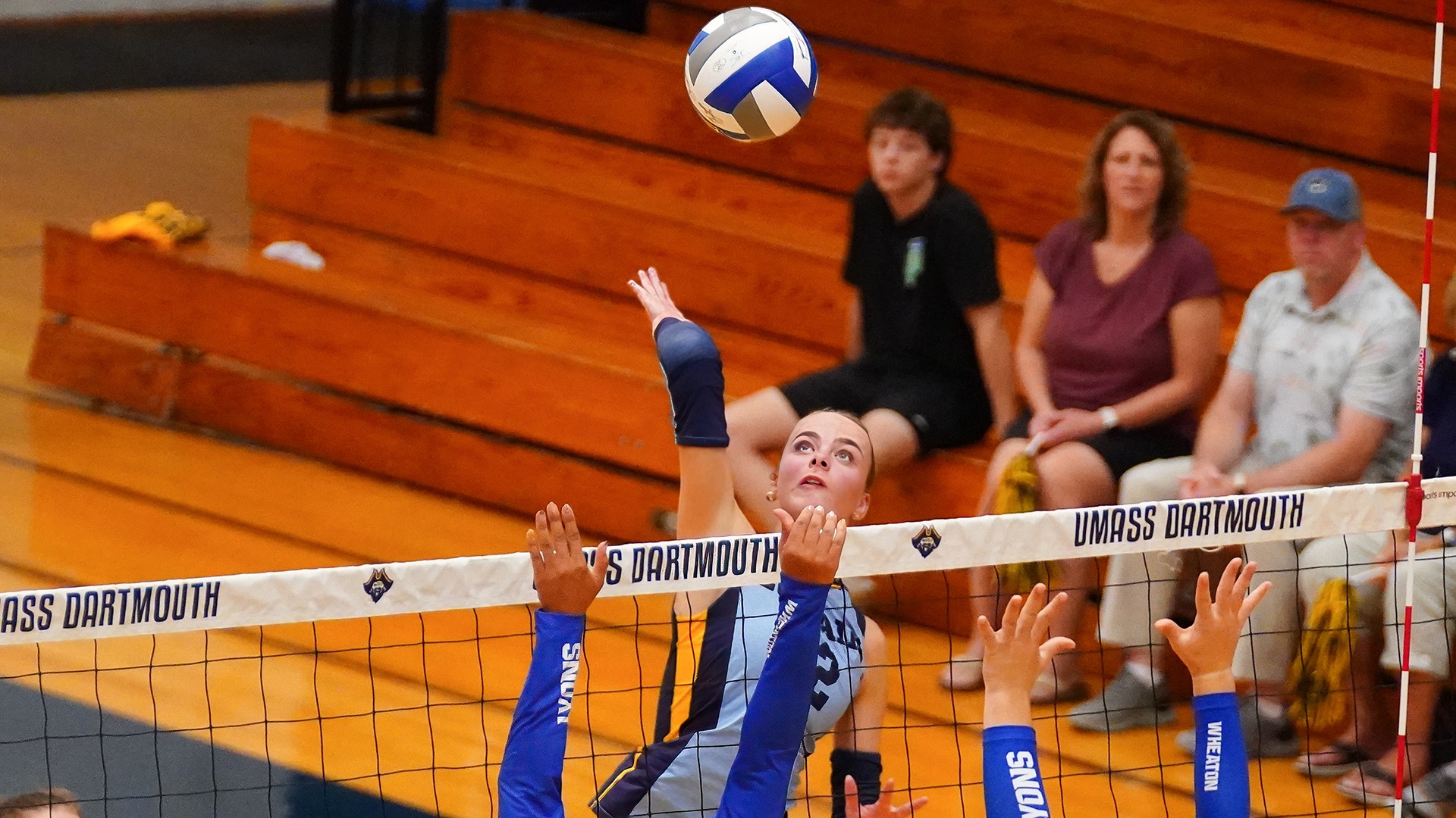 Norah Schweitzer goes up for an attack in a volleyball game