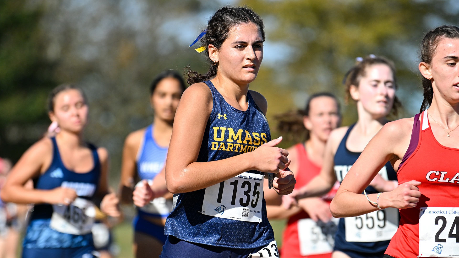 Serena Carnes competes in a cross country race in 2025
