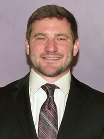 Head shot of Logan Tousaw