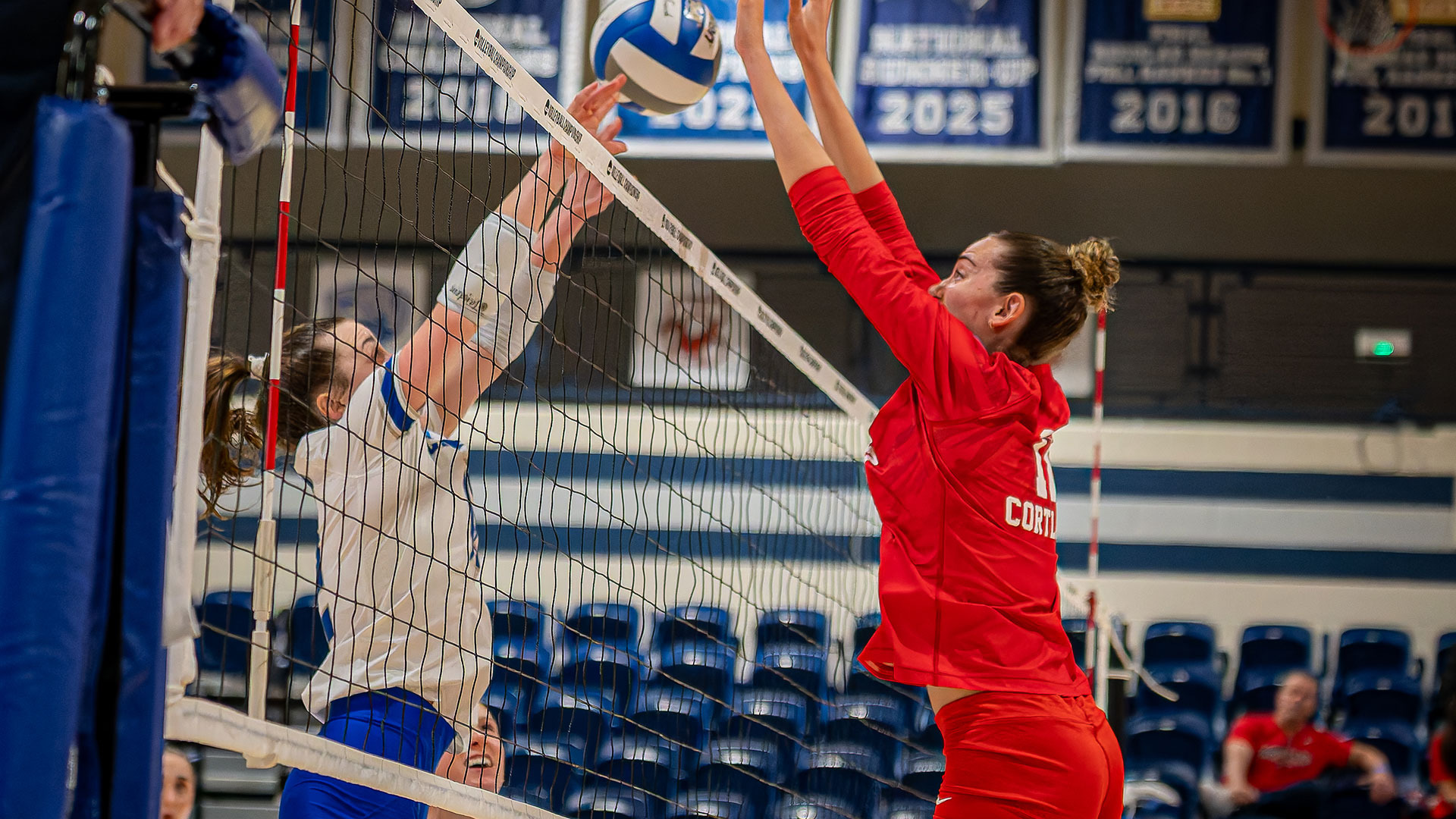 Photo of Emma Reilly during Cortland's 2025 NCAA first round match versus Christopher Newport