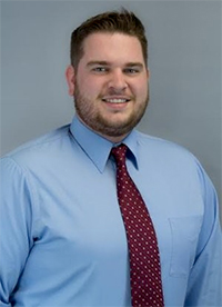 Head shot of assistant CSB hockey coach Cal Herold
