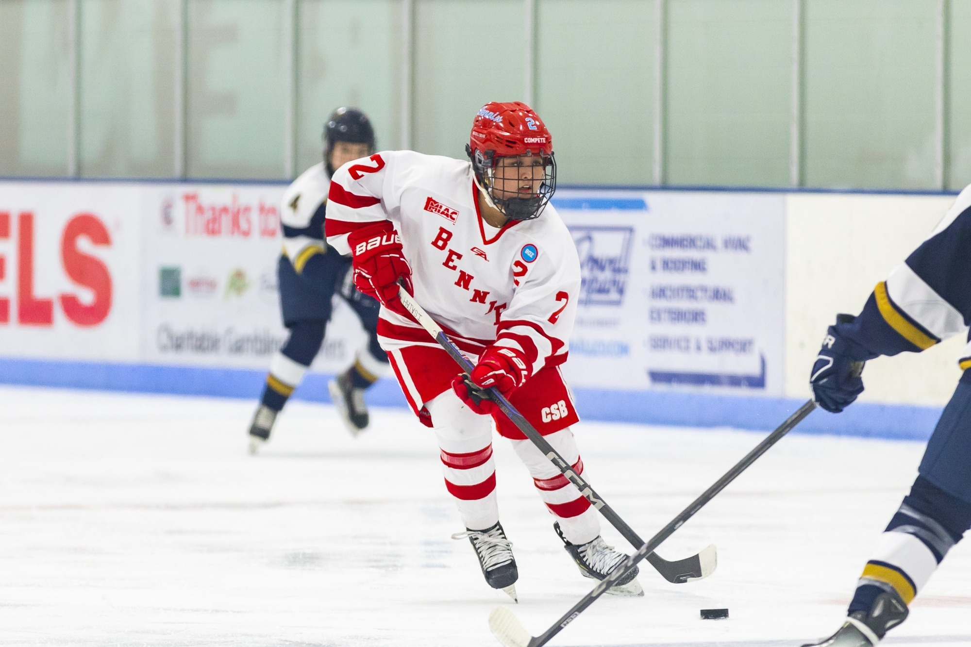 Kaya Pelton-Byce moves puck vs Bethel 2026