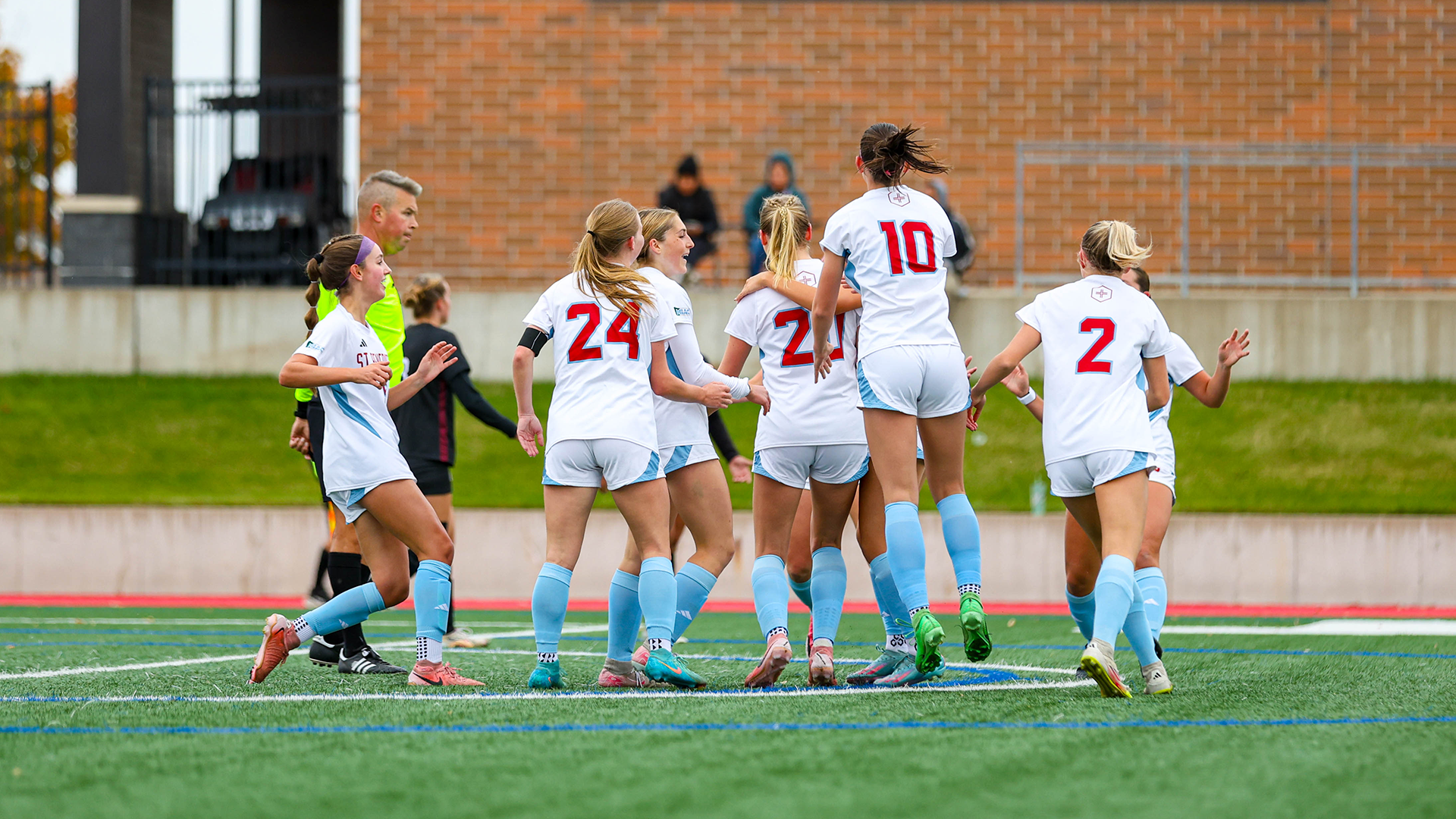 Bennies celebrating a Prairie goal against Hamline Oct. 14, 2026