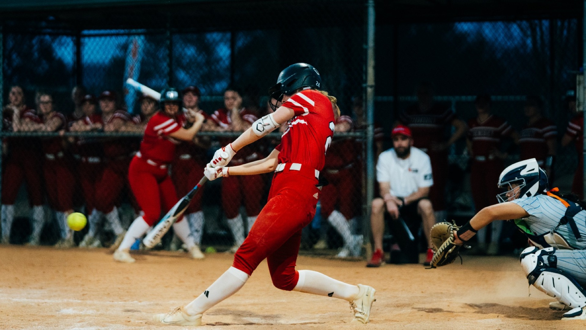 CSB Softball action vs Pomona-Pitzer