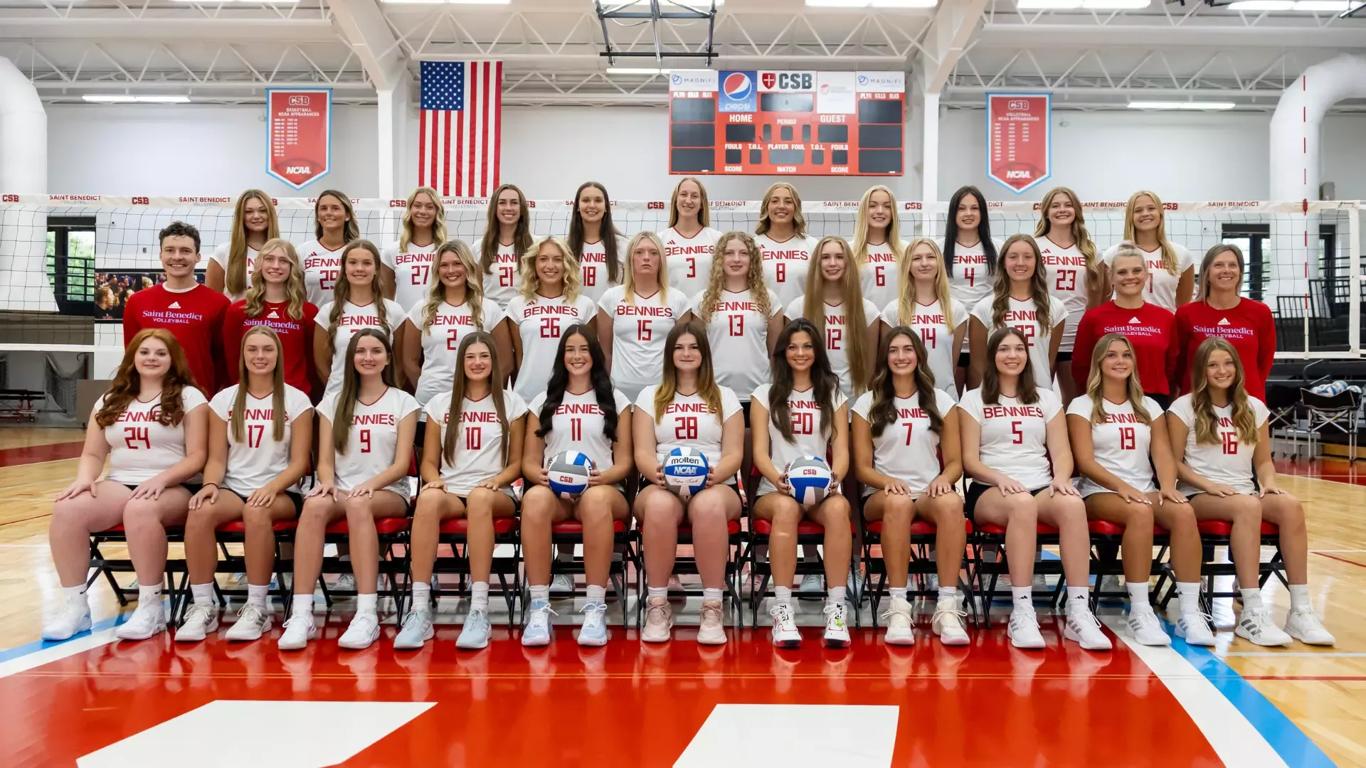 2026 CSB Volleyball Team Photo with coaches in gym