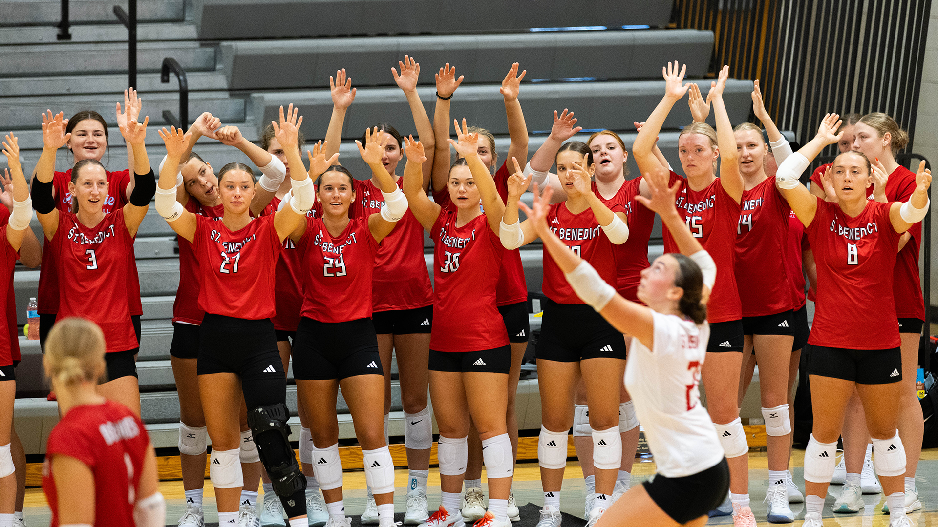 Bench doing a cheer during a Burns serve at Central Sept. 5, 2026