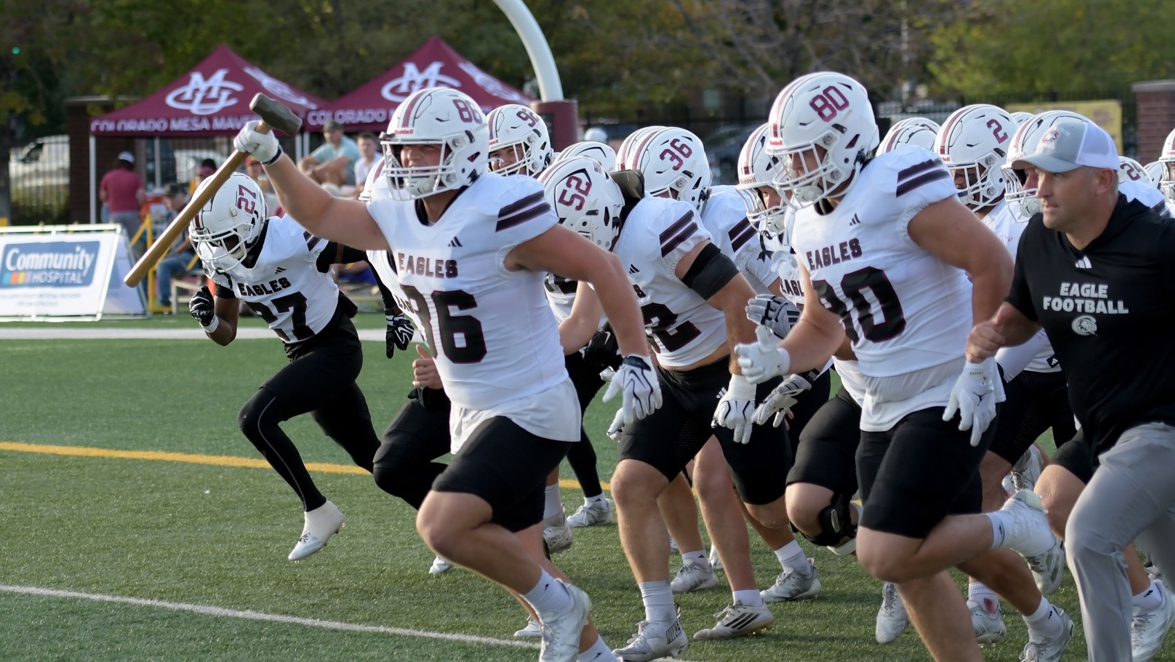 Koye Gilbert leading CSC football out with the hammer vs. CMU