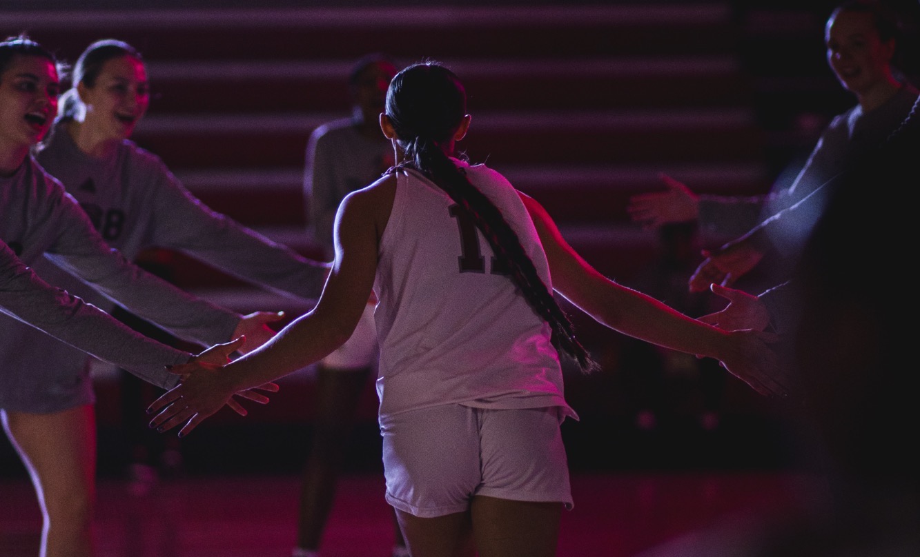 Kenna Wagner running out of team tunnel for warmups