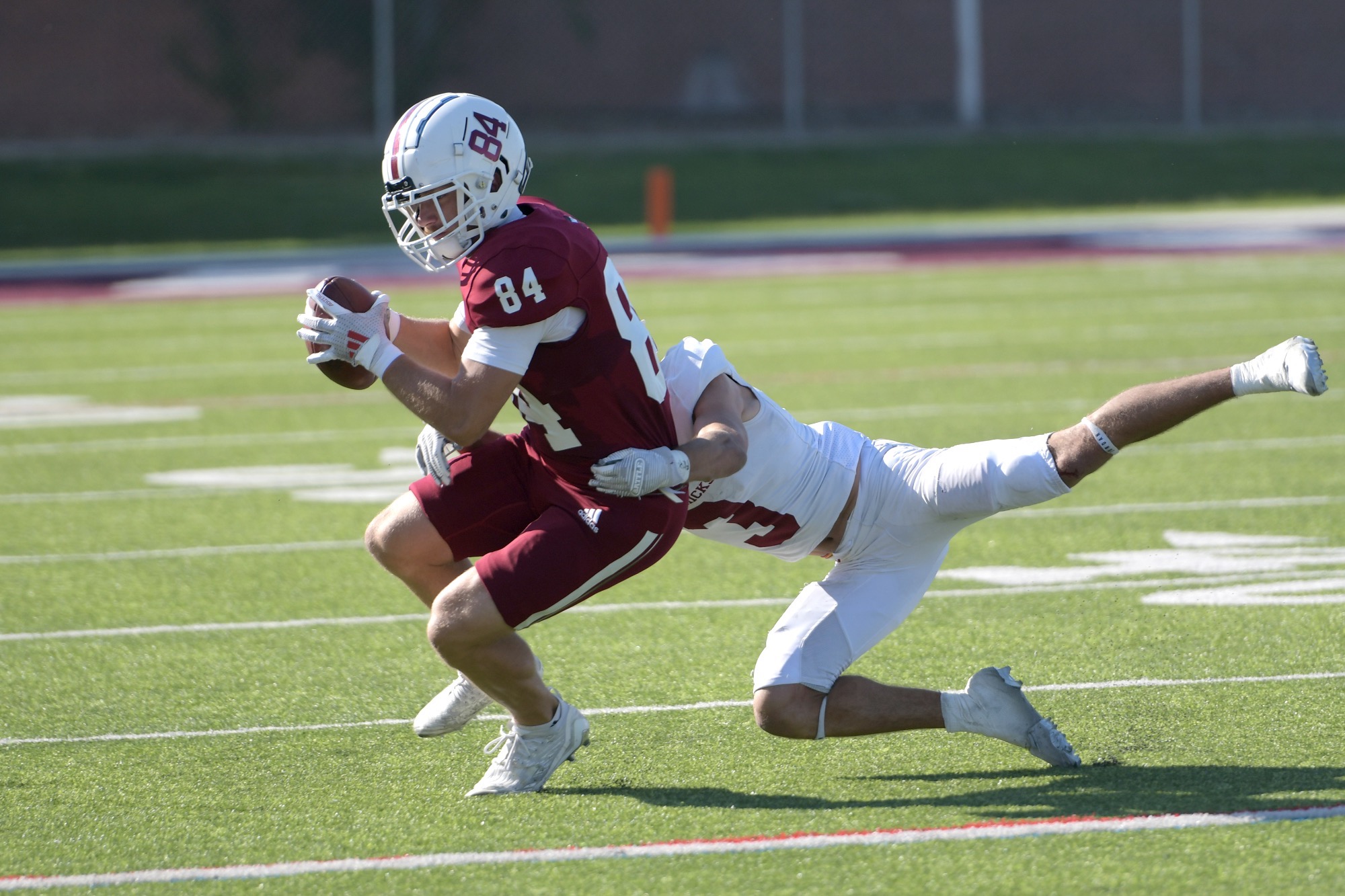 Devon Sundgren makes a sliding catch vs. Colorado Mesa during a 2025 football game.