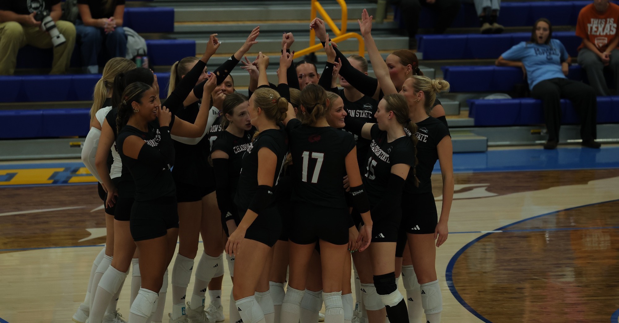Volleyball Team Huddle vs. Fort Lewis