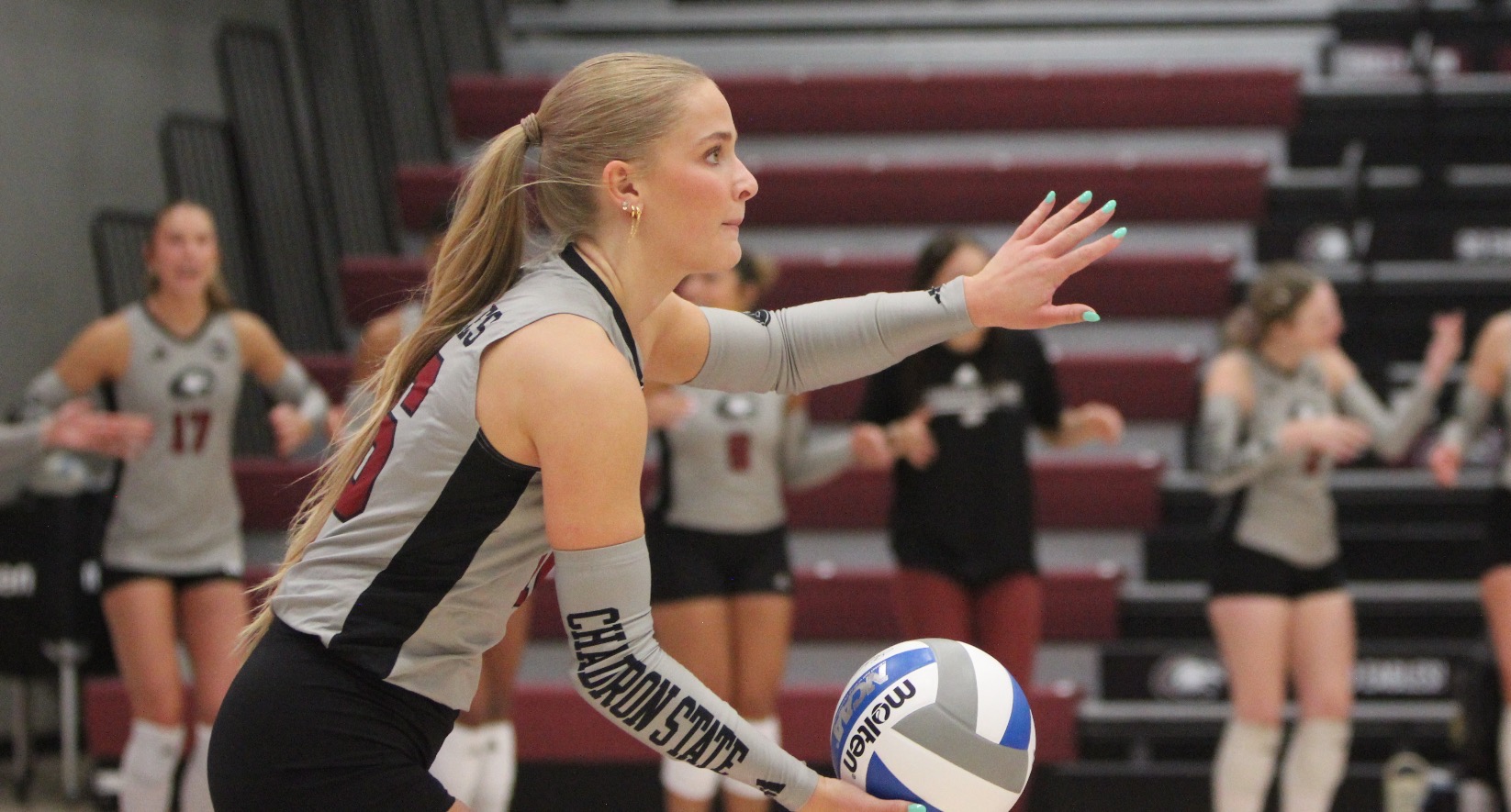 Kali Reiners preparing to serve vs. CCU