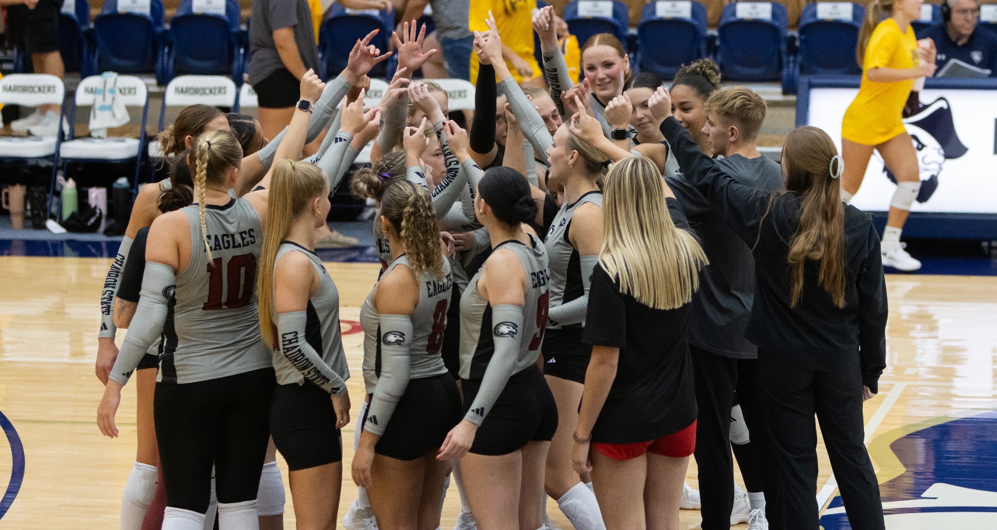 VB Team breaking huddle @ South Dakota Mines