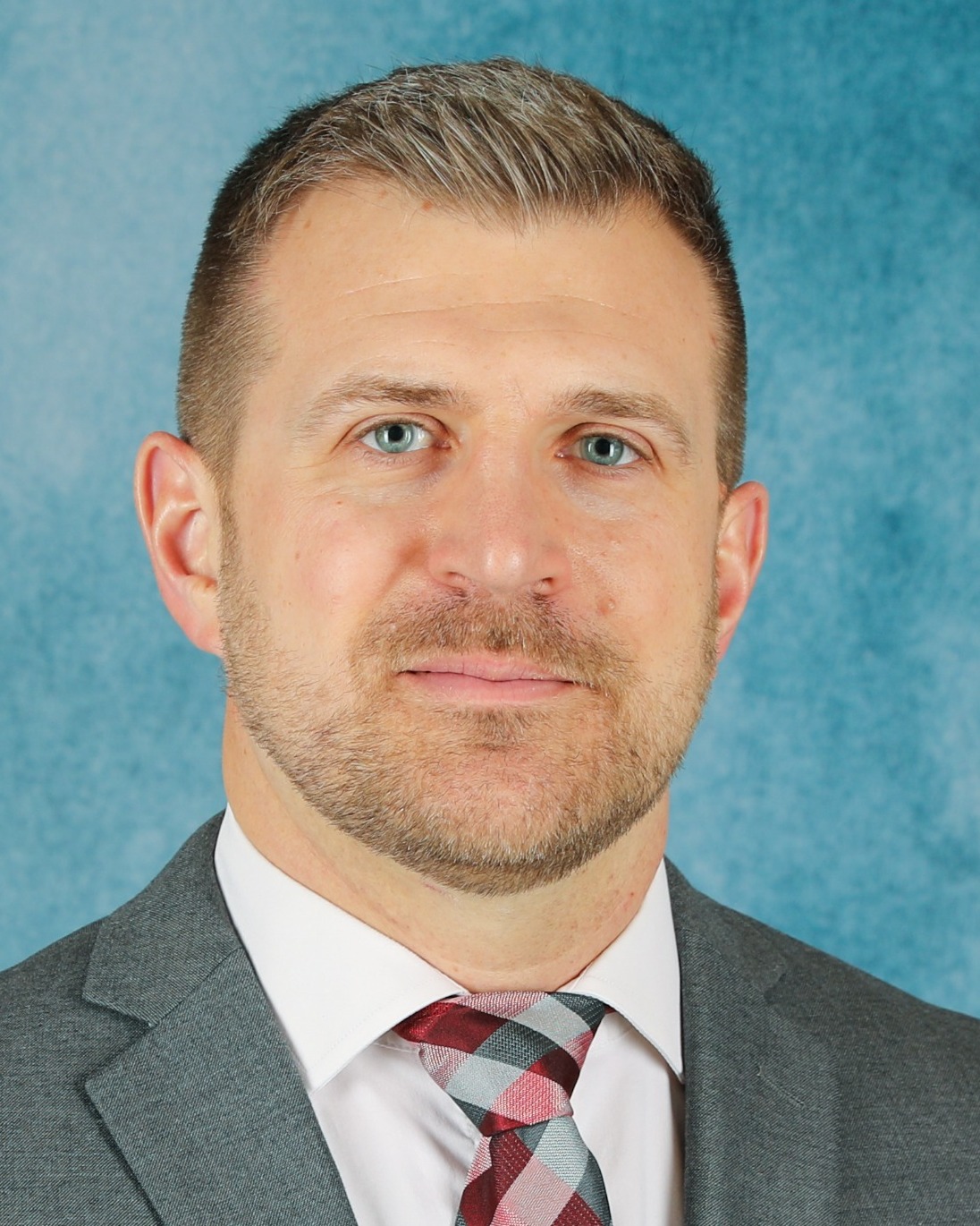 Coach Joshua Schumacher