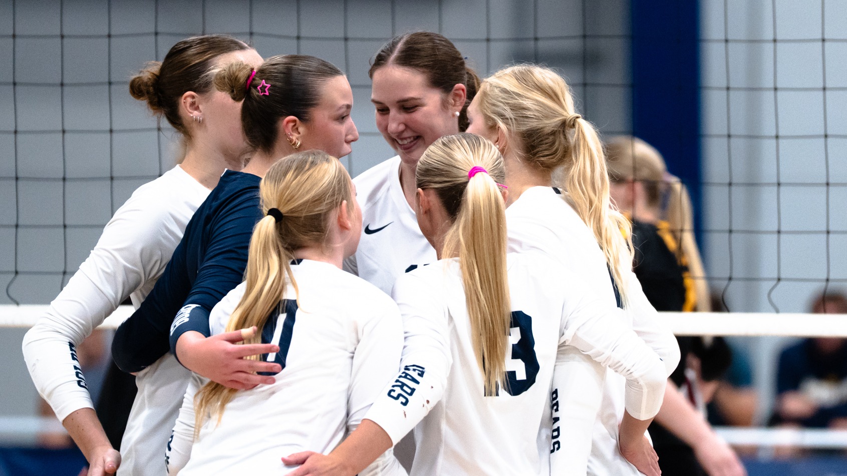 Volleyball team huddle vs Northern State 2026