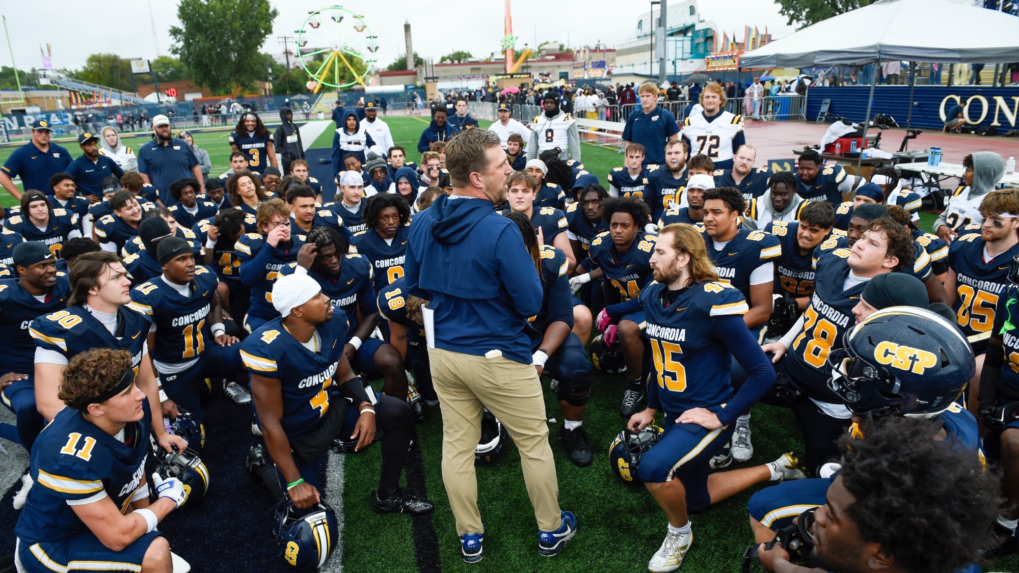 2026 football team postgame huddle vs BSU