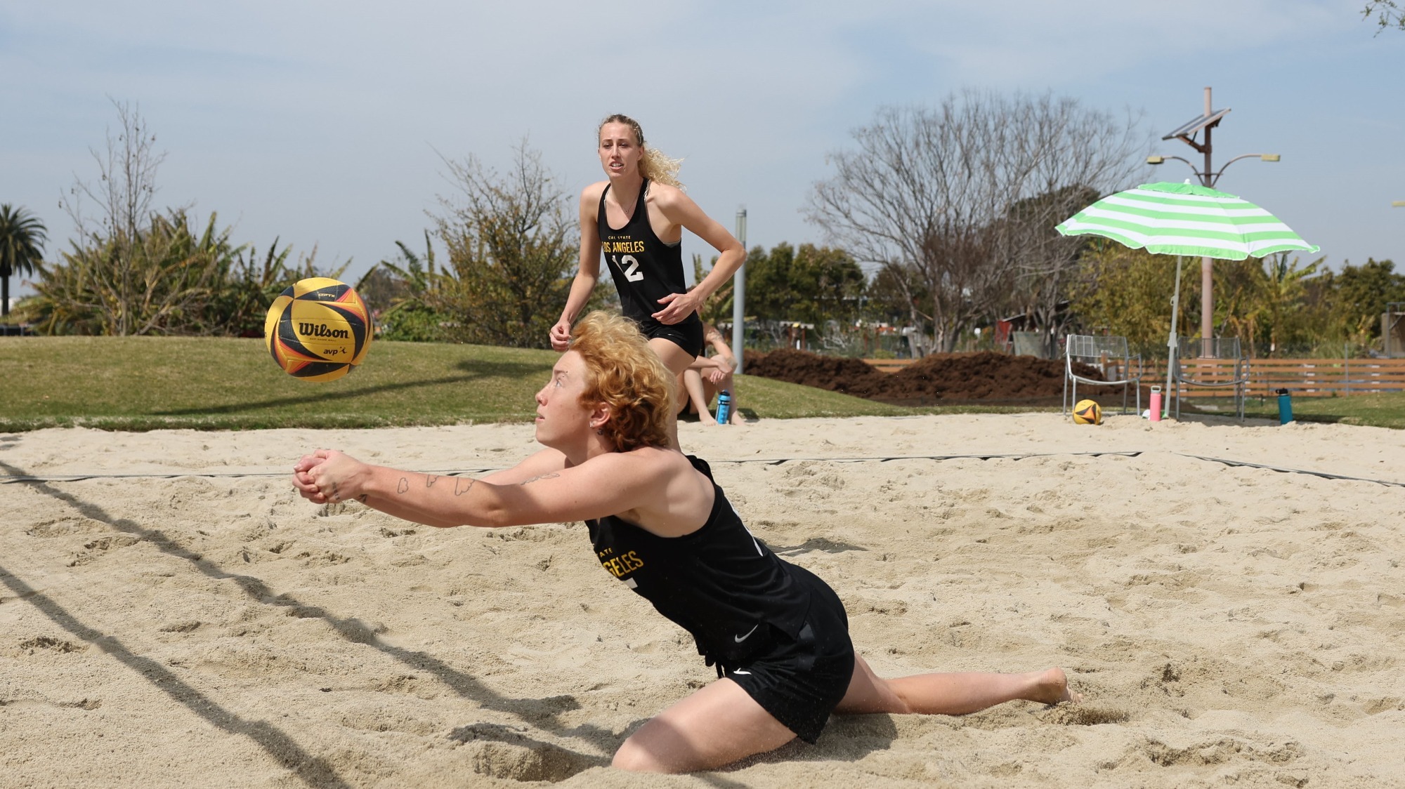 jameson sanders makes a great dig in the sand