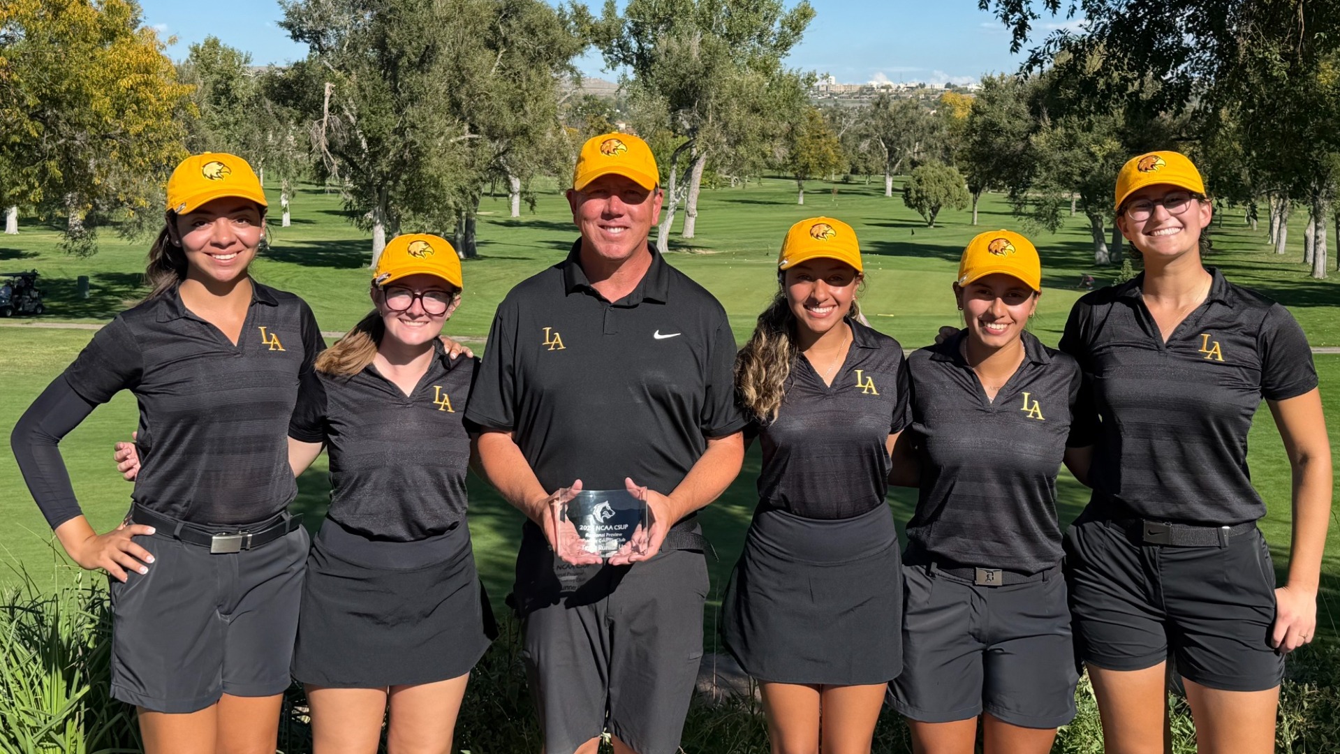 cal state la golf team poses with runner-up trophy at west regional preview