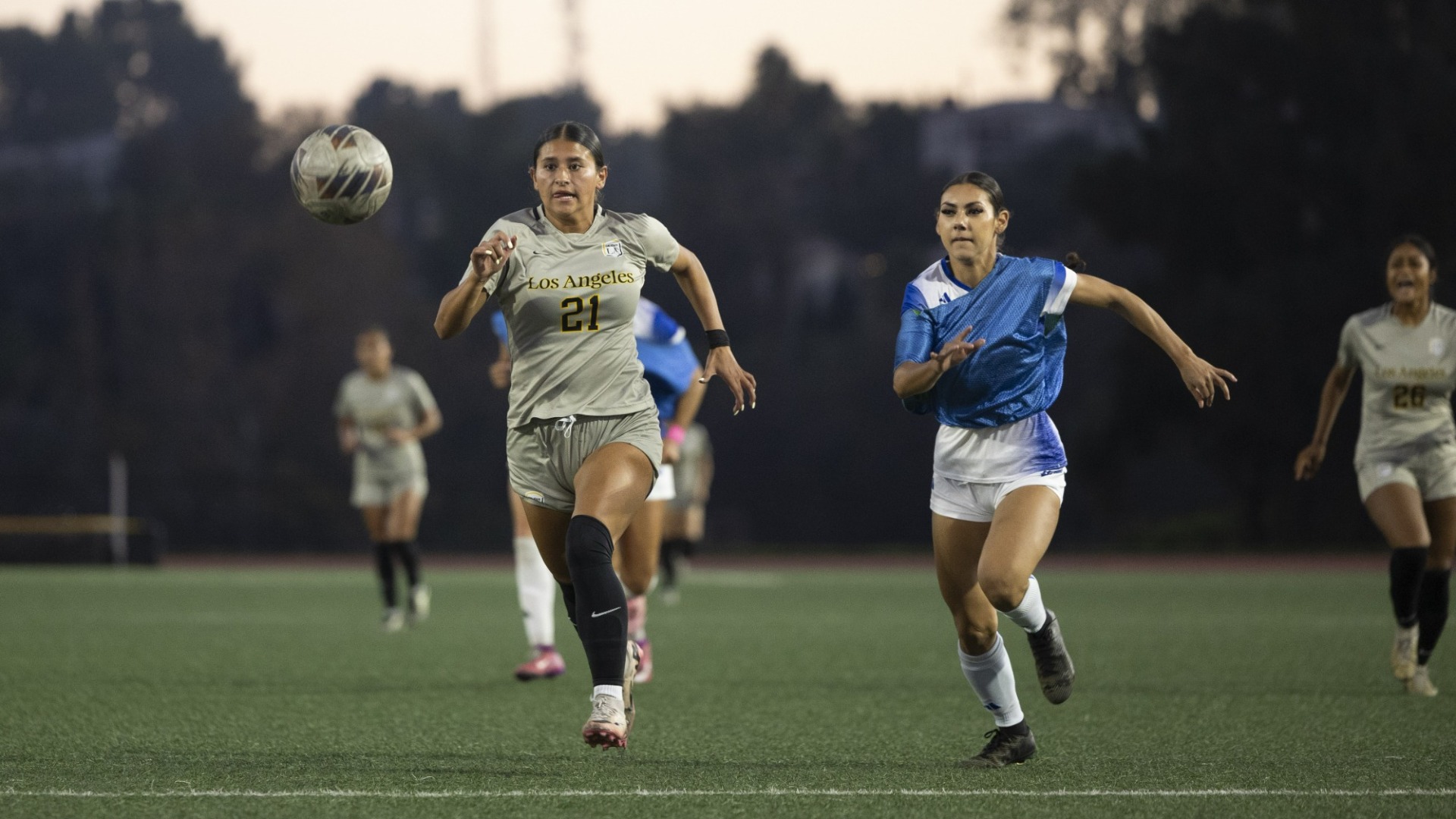 kristin mijares dribbles against cal state san bernardino defense