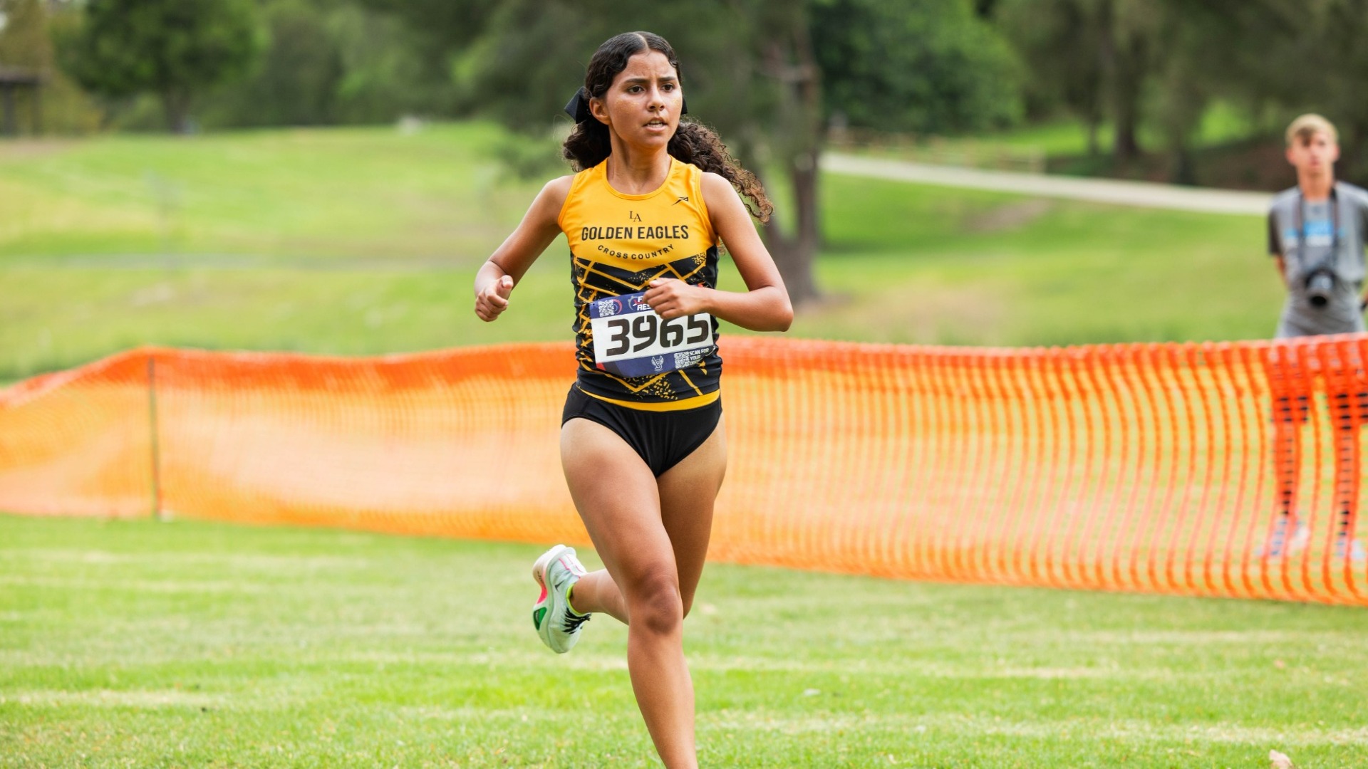miyoko mataalii runs toward the finish line in cross country race