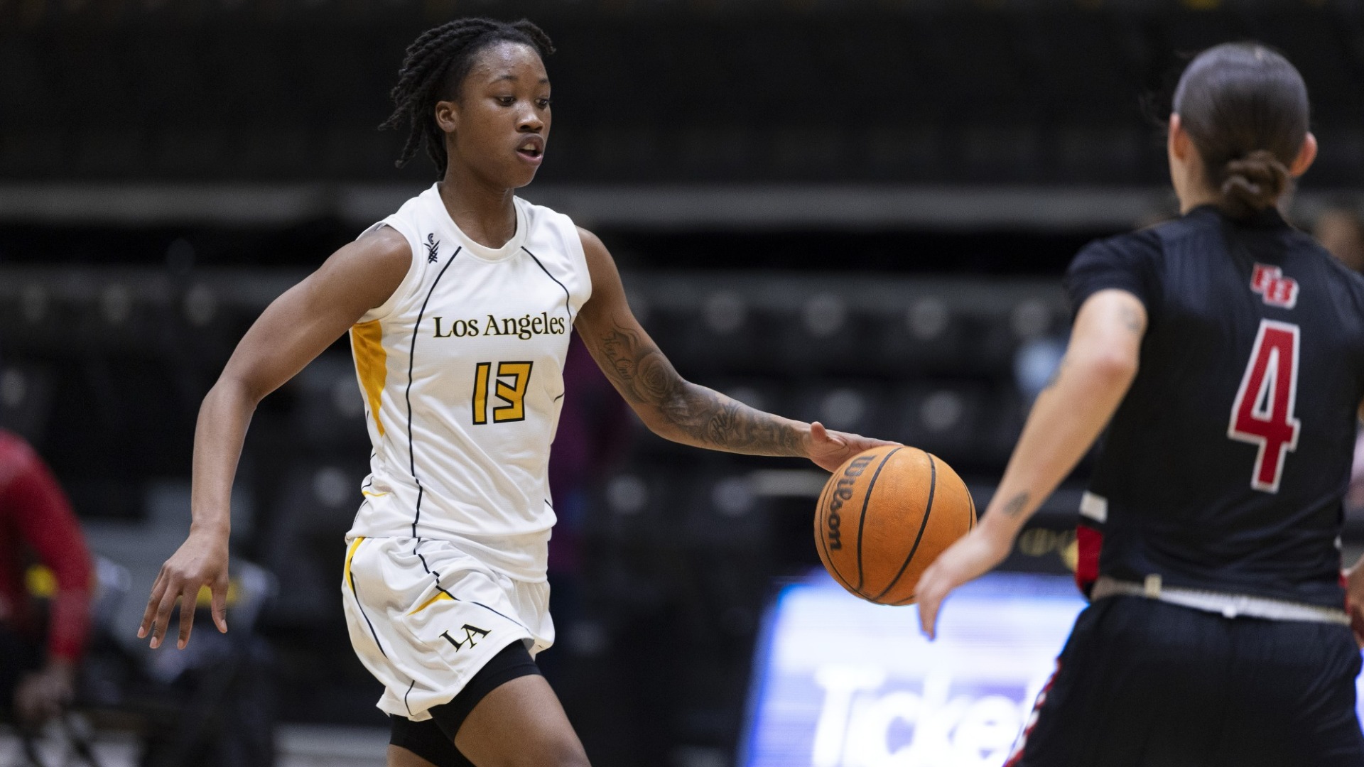 mariah blake brings the ball upcourt against pressure