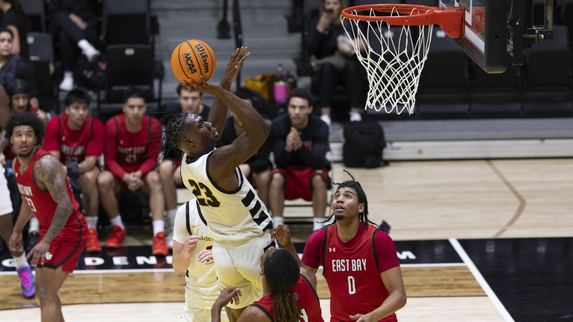 deraje agbaosi goes up for a shot in the lane
