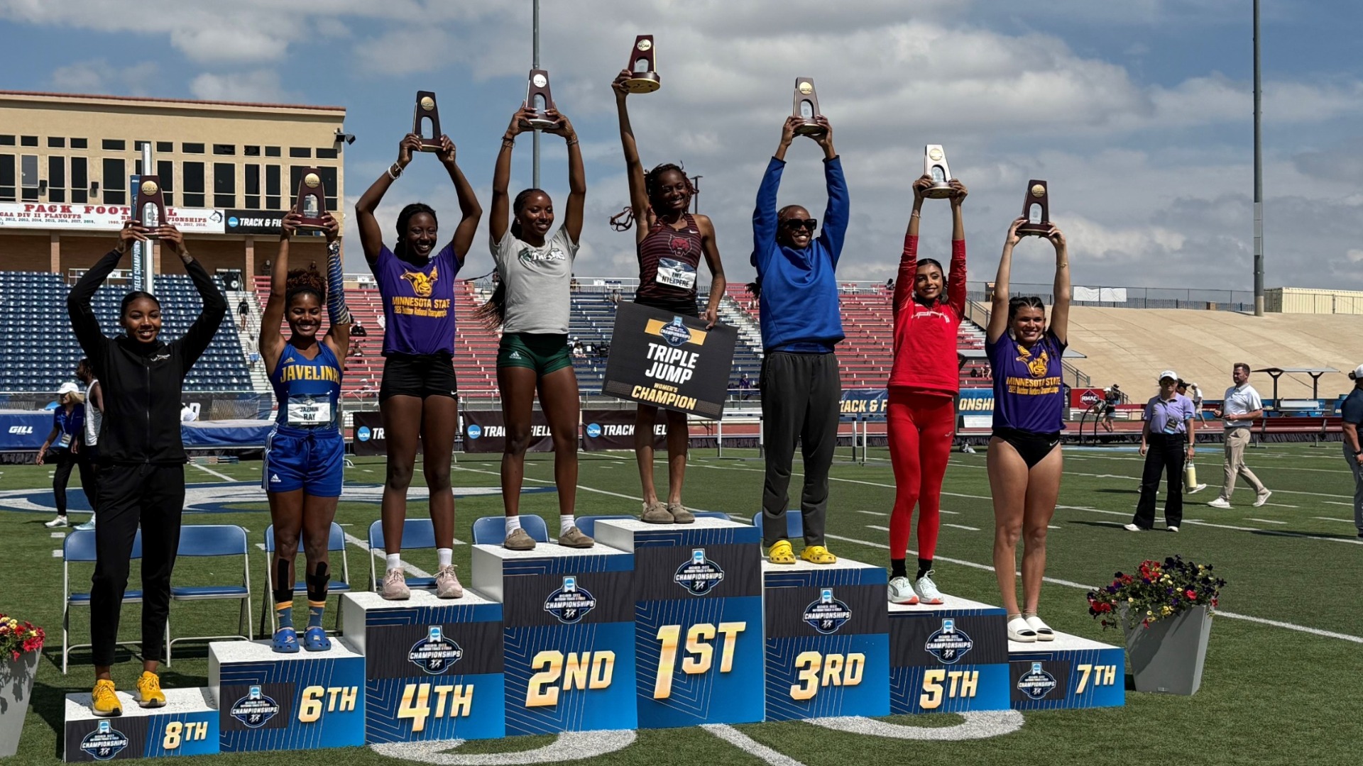 jonon young on the triple jump podium