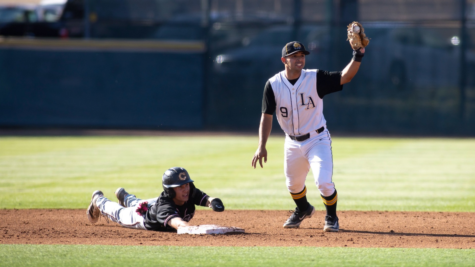 javy espinoza reacts after tagging out a Chico State baserunner