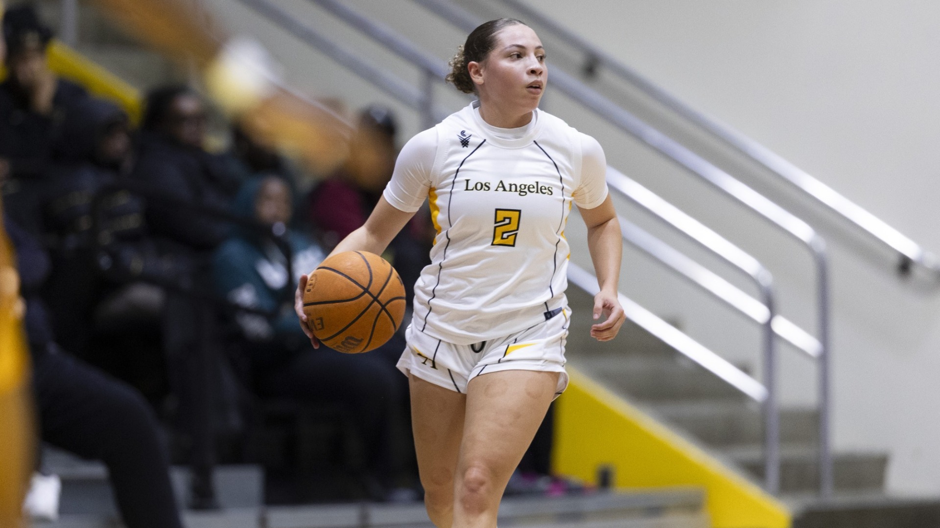 ariyah smith dribbles upcourt