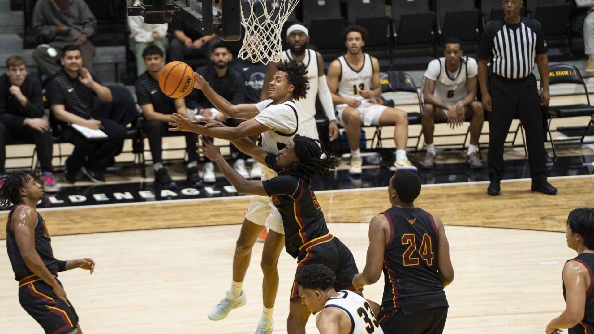 connor scales gets fouled on a drive to the basket