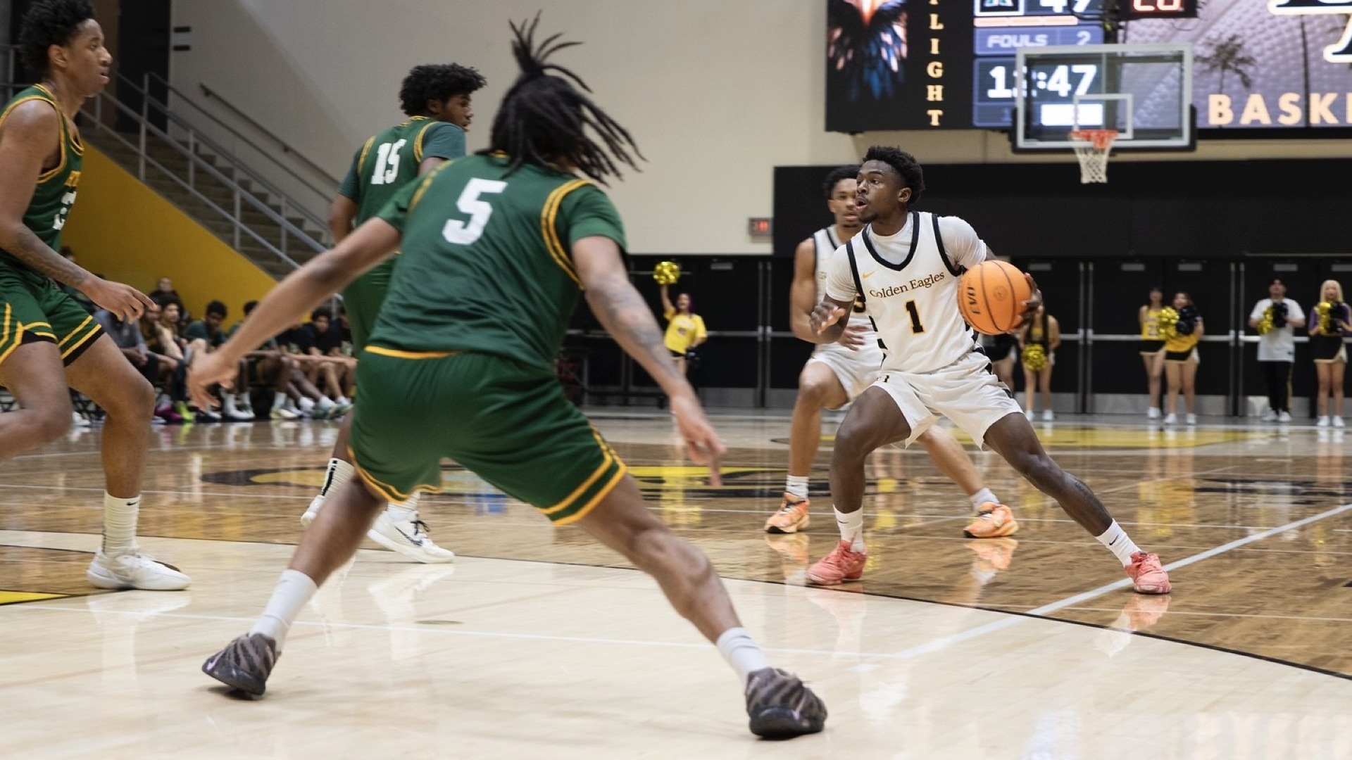 michael pearson jr. dribbles against cal poly humboldt