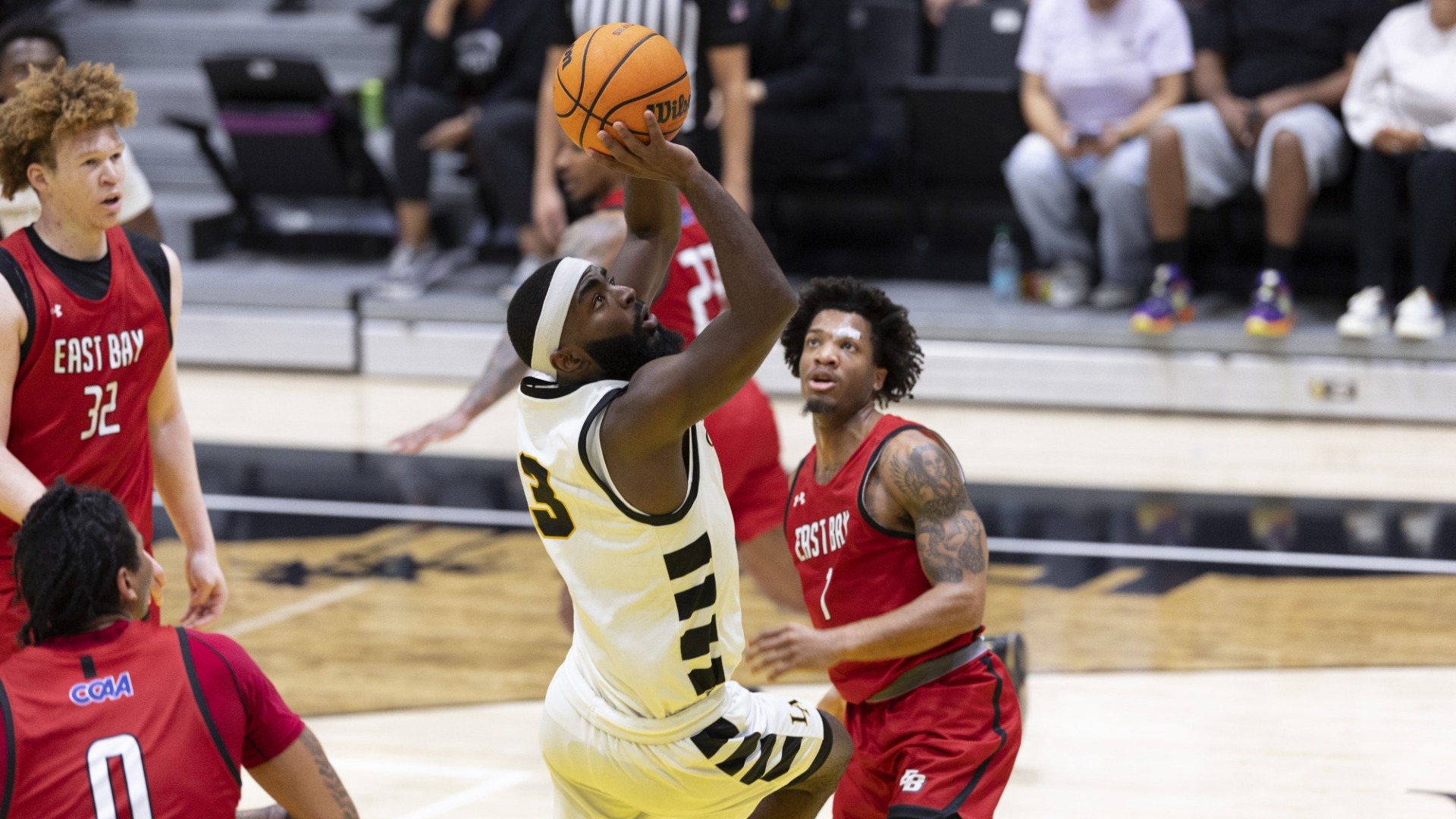 khemanni davis takes a shot in the lane