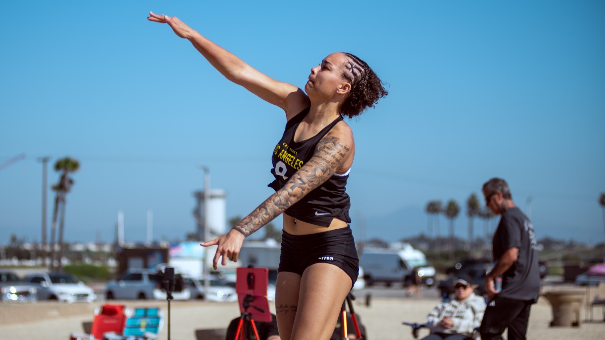 samaraha dacoud hits a shot during beach volleyball match