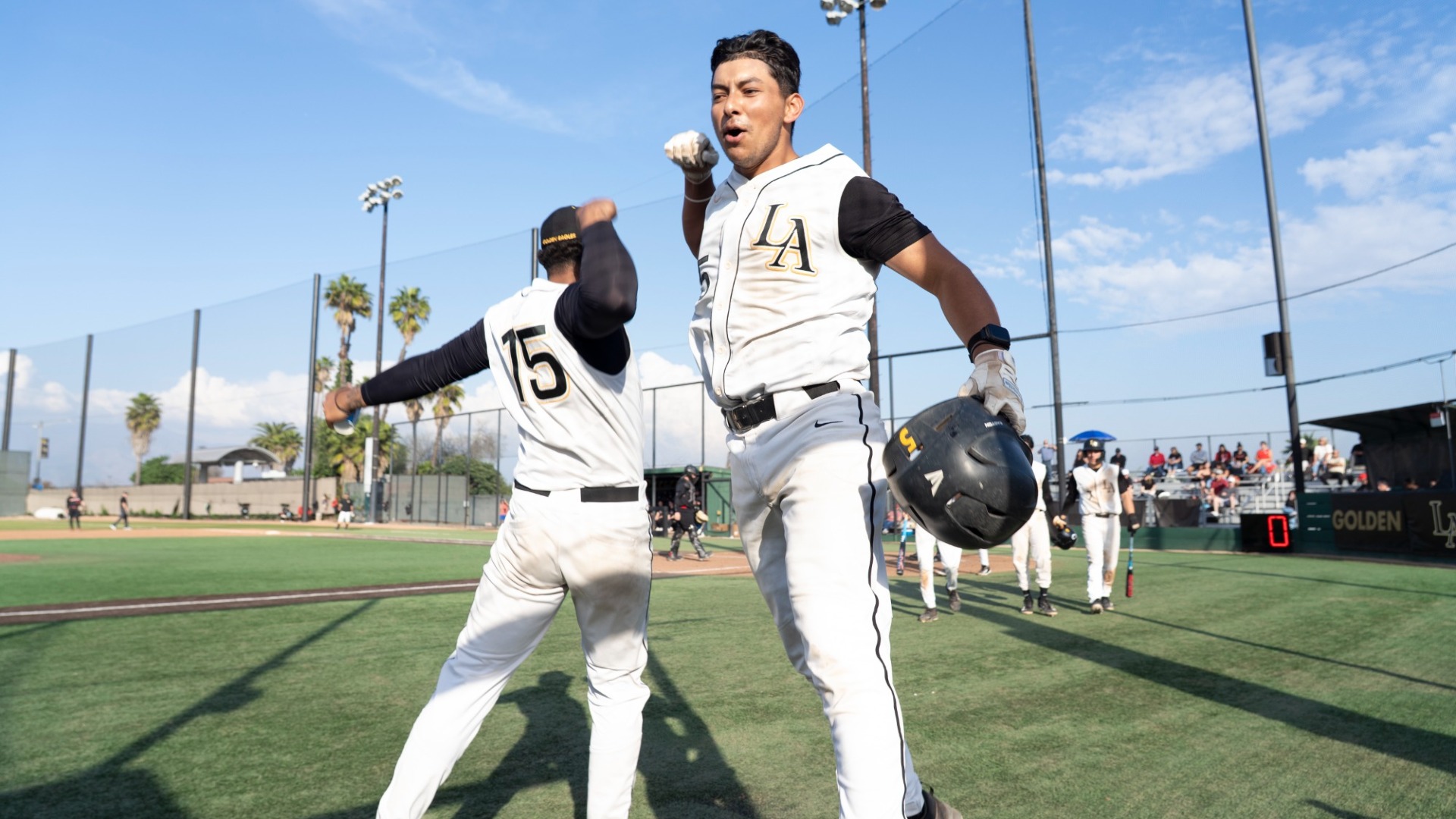 alberto prado and elijah bobo celebrate a home run