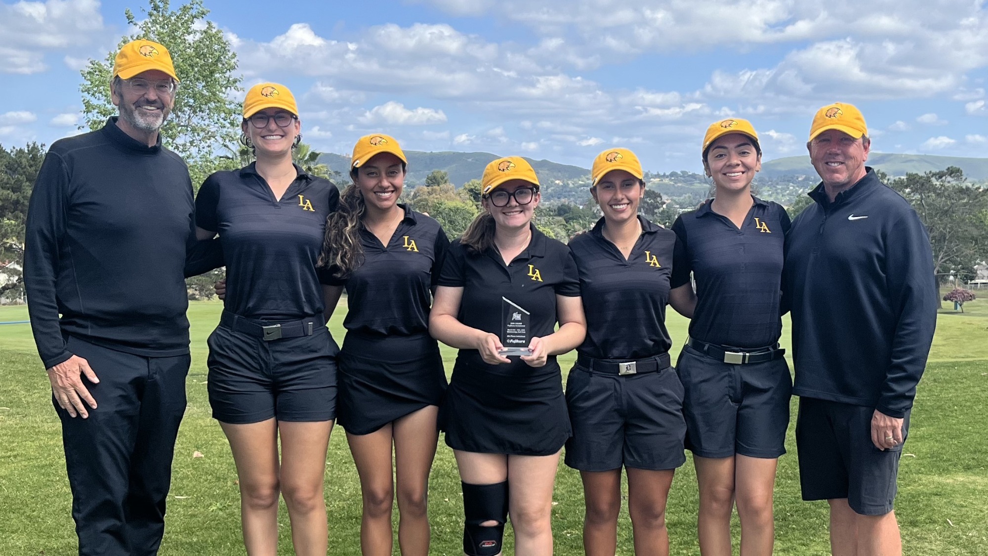golf team poses for team picture at Shadowridge Golf Club